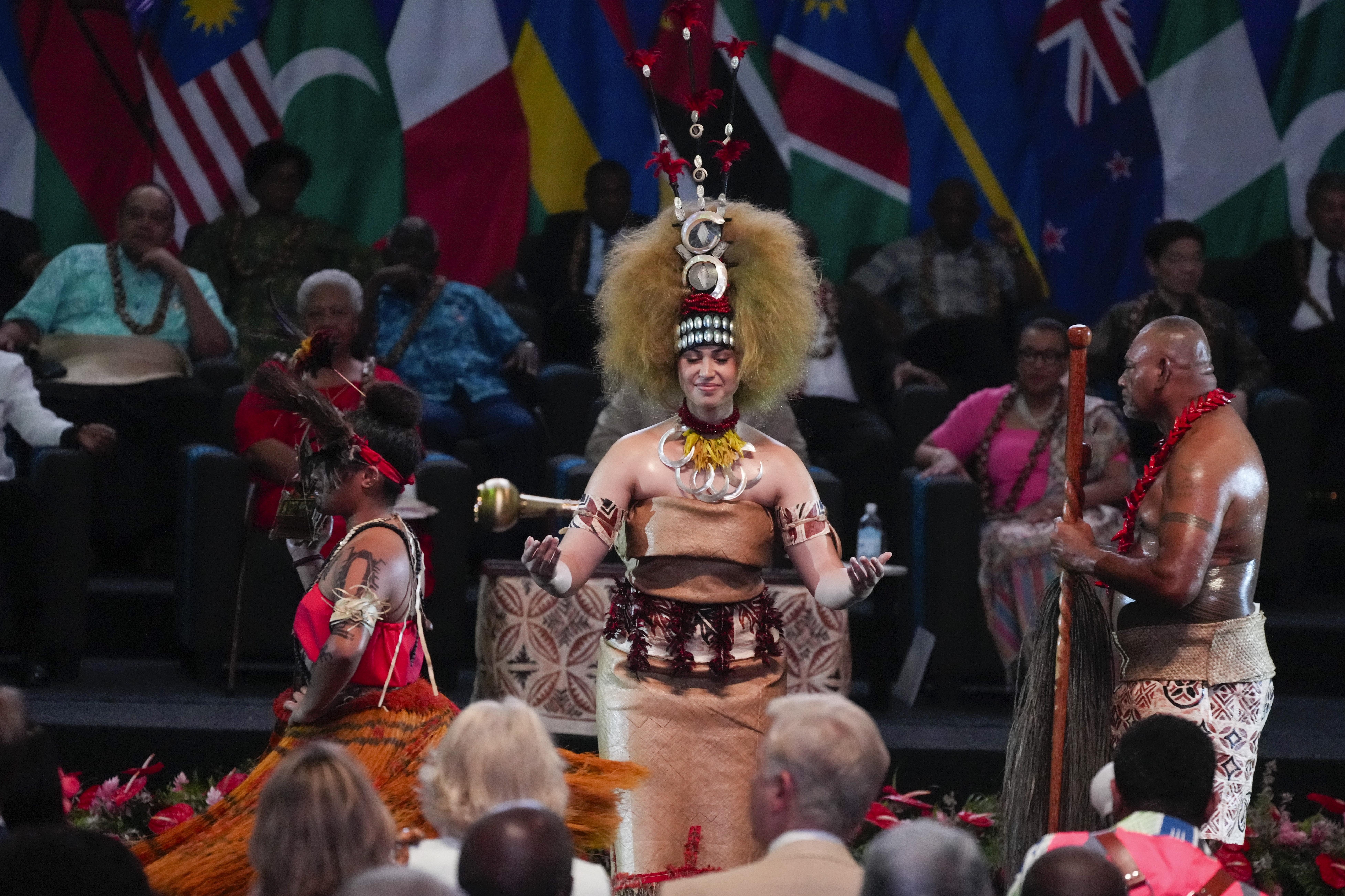 Dancers perform during the opening ceremony for the Commonwealth Heads of Government meeting in Apia, Samoa, Friday, Oct. 25, 2024. (AP Photo/Rick Rycroft/Pool)