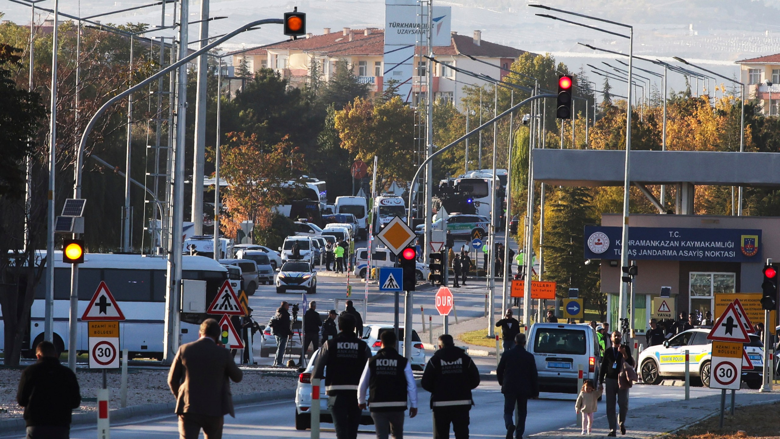 Emergency and security teams are deployed outside of Turkish Aerospace Industries Inc. at the outskirts of Ankara, Turkey, Wednesday, Oct. 23, 2024. (Yavuz Ozden/Dia Photo via AP)