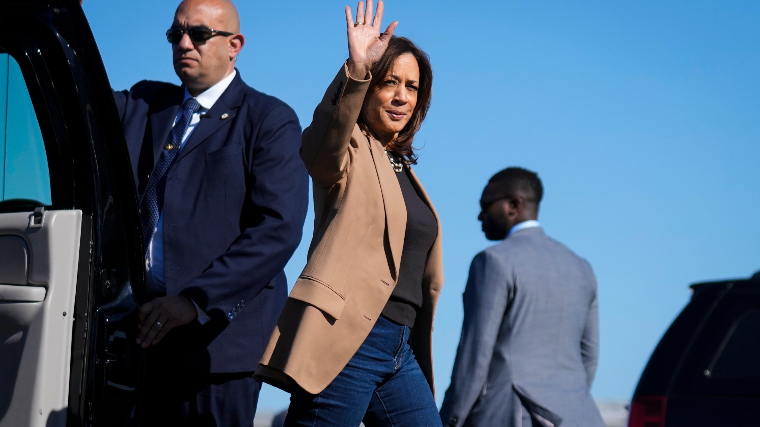 Democratic presidential nominee Vice President Kamala Harris Vice waves as she walks to board Air Force Two at Philadelphia International Airport in Philadelphia, Thursday, Oct. 24, 2024, en route to Atlanta. (AP Photo/Matt Rourke)