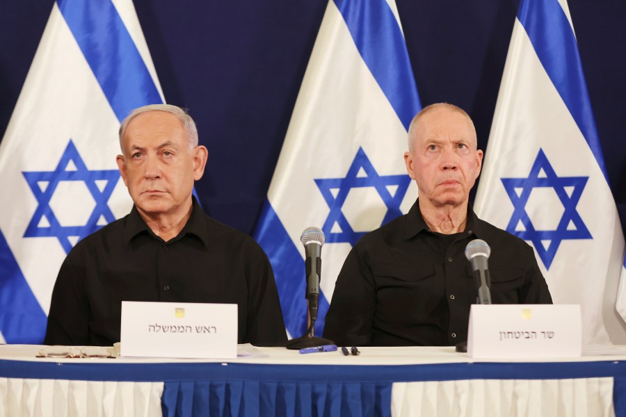 FILE - Israeli Prime Minister Benjamin Netanyahu, left and Defense Minister Yoav Gallant attend a news conference at the Kirya military base in Tel Aviv, Israel, Oct. 28, 2023. (Abir Sultan/Pool Photo via AP, File)