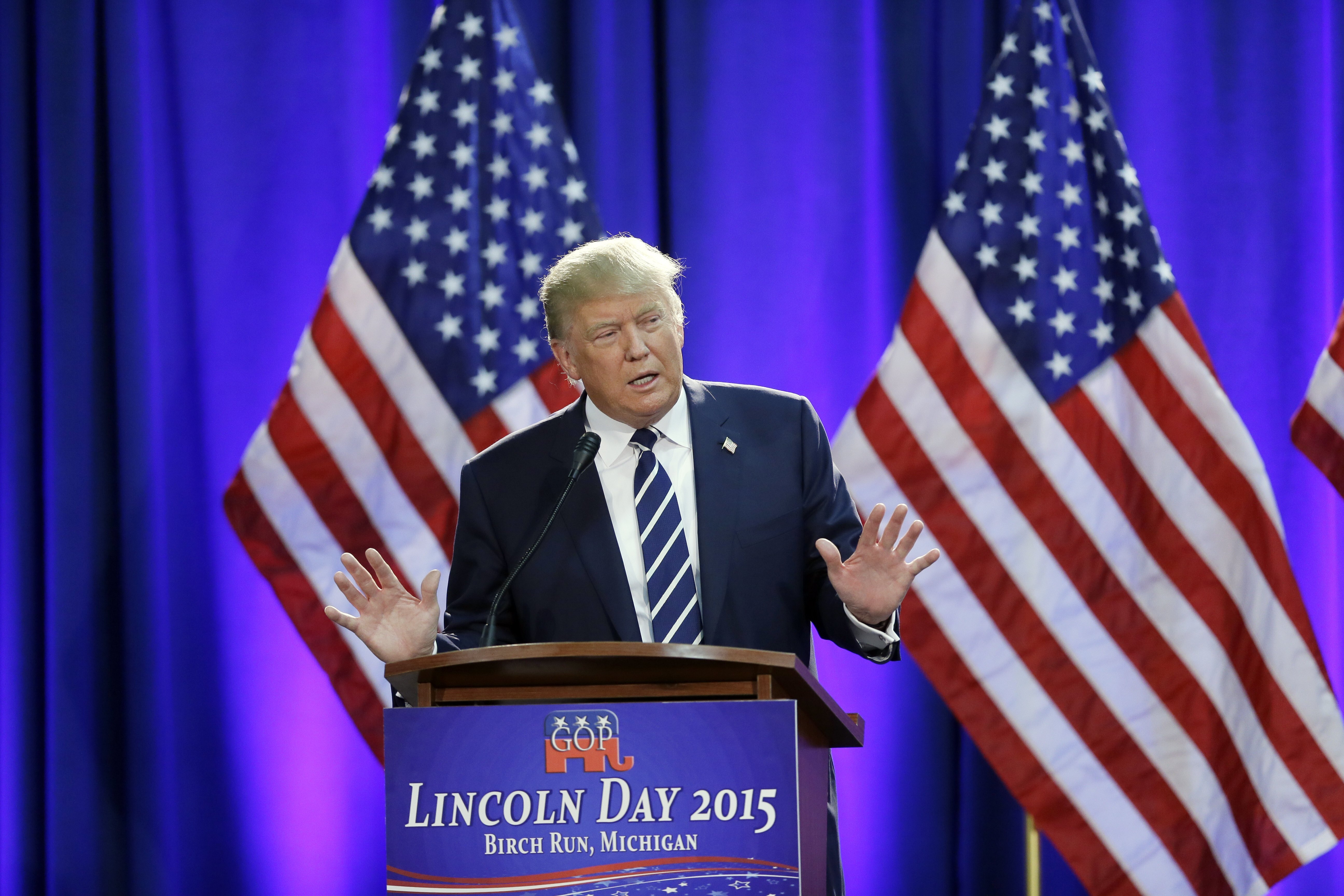 FILE - Republican presidential candidate Donald Trump addresses a GOP fundraising event, Aug 11, 2015, in Birch Run, Mich. (AP Photo/Carlos Osorio, File)