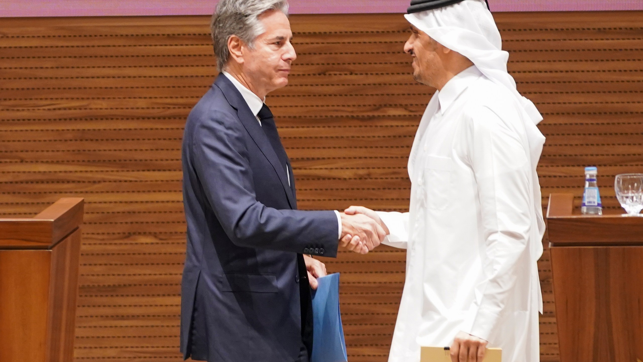 U.S. Secretary of State Antony Blinken, left, and Qatari Prime Minister and Foreign Minister Mohammed bin Abdulrahman Al Thani shake hands as they attend a press conference in Doha, Qatar, Thursday, Oct. 24, 2024. (Nathan Howard/Pool Photo via AP)