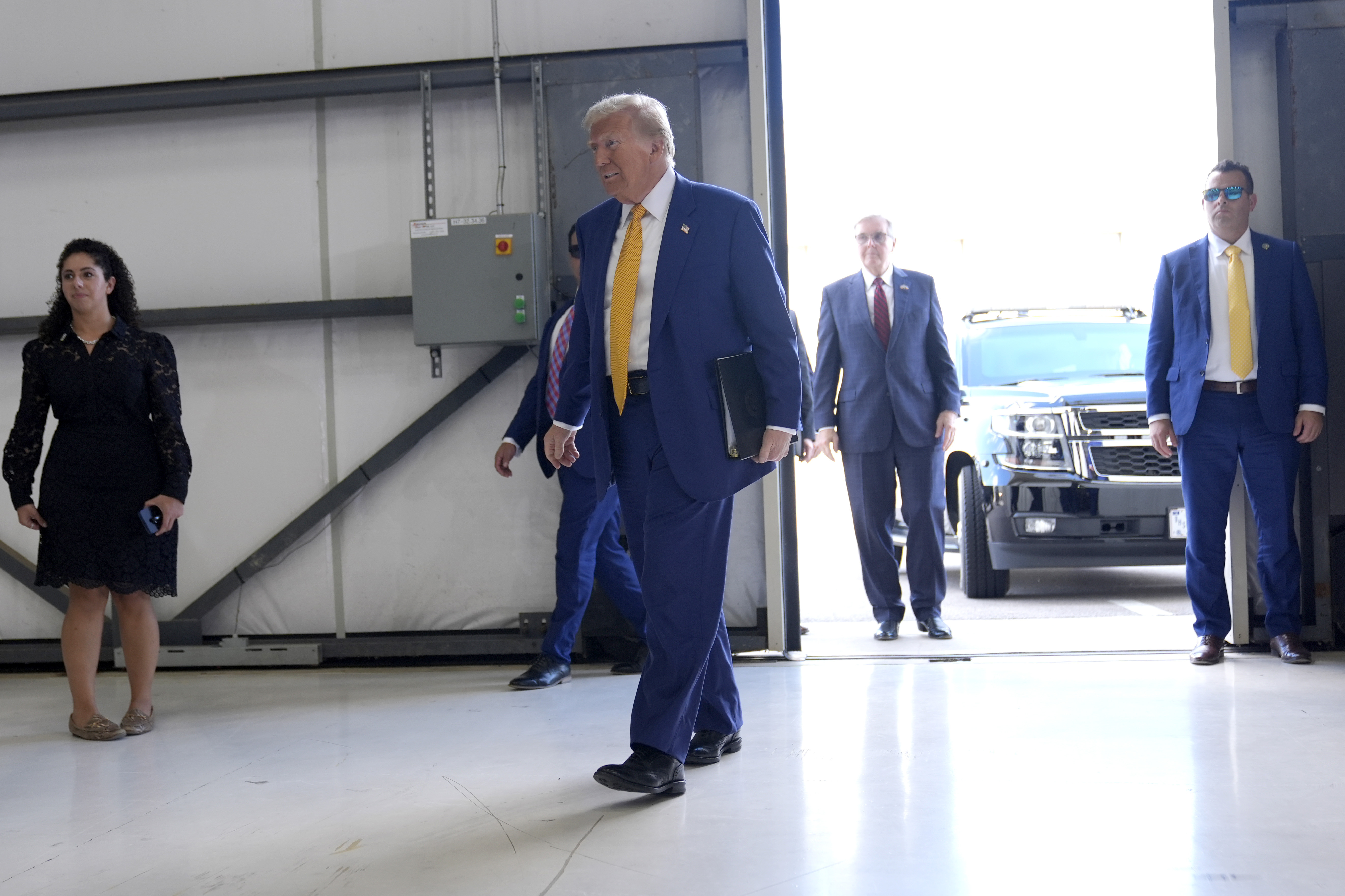 Republican presidential nominee former President Donald Trump arrives to speak at a news conference at Austin-Bergstrom International Airport, Friday, Oct. 25, 2024, in Austin, Texas. (AP Photo/Alex Brandon)