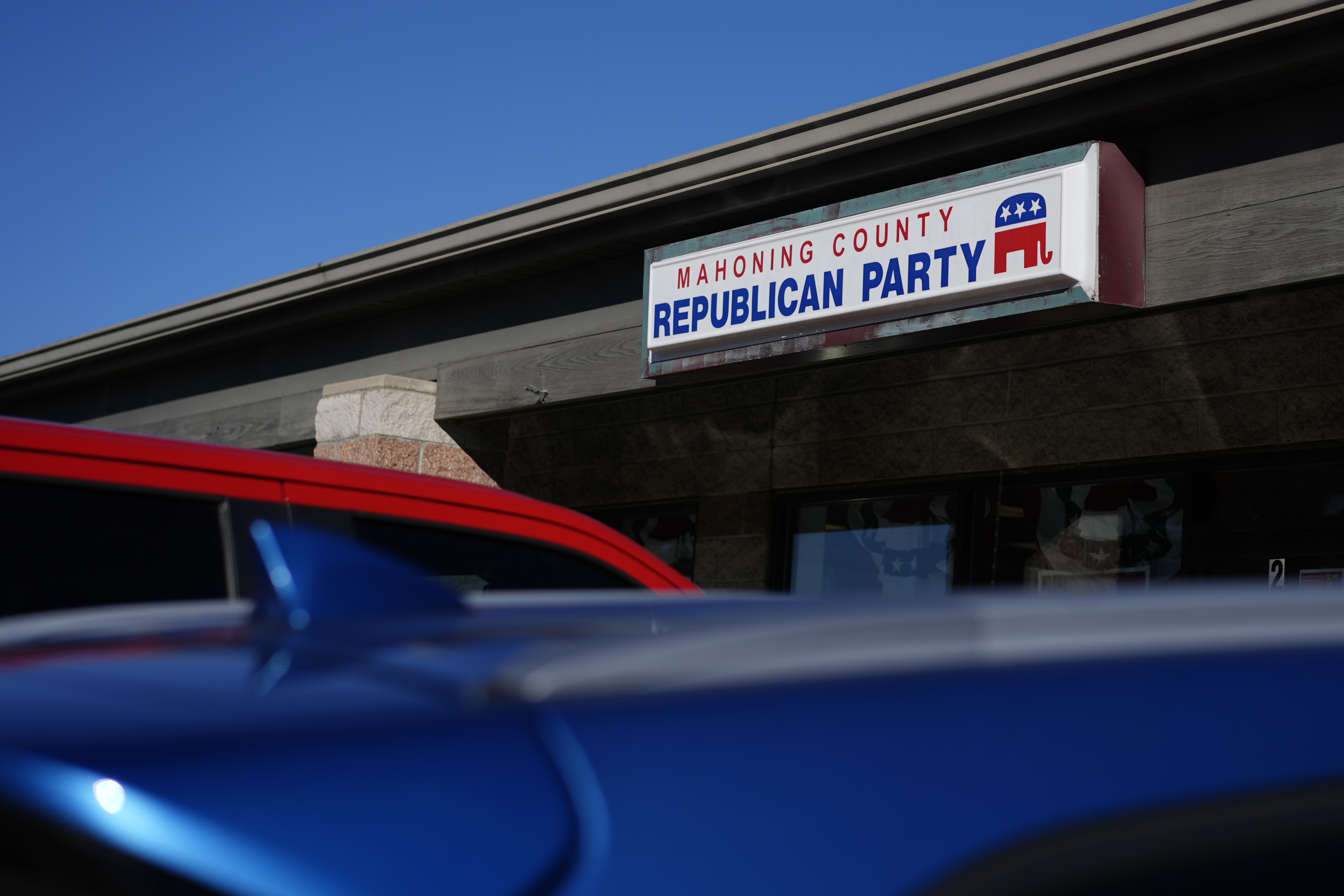 Cars are parked in front of the Mahoning County Republican Party headquarters in Boardman, Ohio, Thursday, Oct. 17, 2024. (AP Photo/Carolyn Kaster)