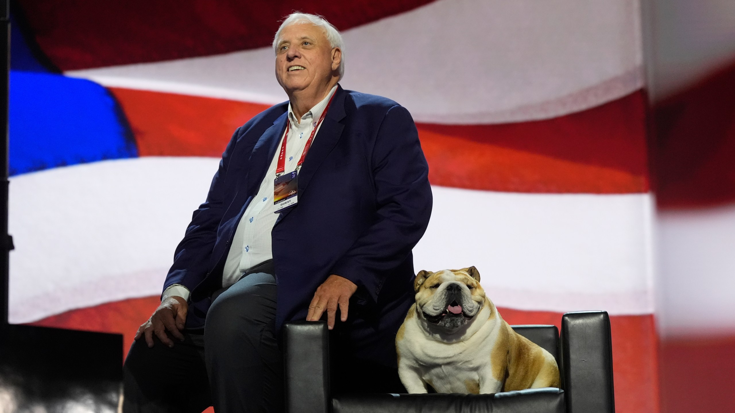 FILE - West Virginia Gov. Jim Justice checks out the stage with his dog, "Babydog," before the Republican National Convention, July 16, 2024, in Milwaukee. (AP Photo/Jae C. Hong, File)