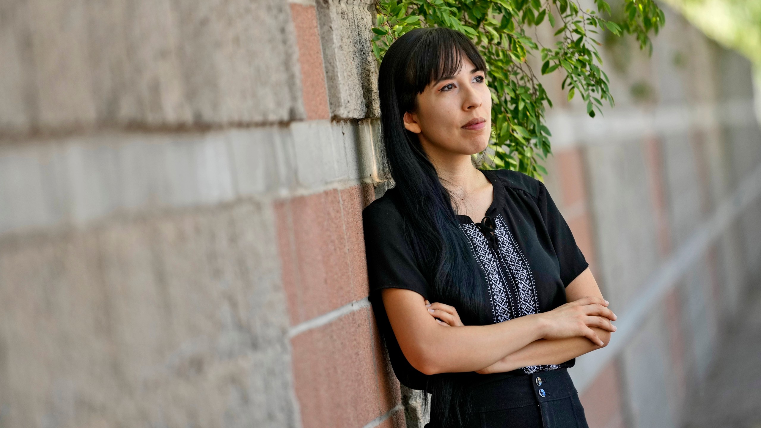 Jocelyn Ruiz, 26, pictured in Tempe, Ariz., Tuesday, Oct. 22, 2024, is a U.S. citizen who discovered a family secret that her mother could be deported at any time. (AP Photo/Matt York)