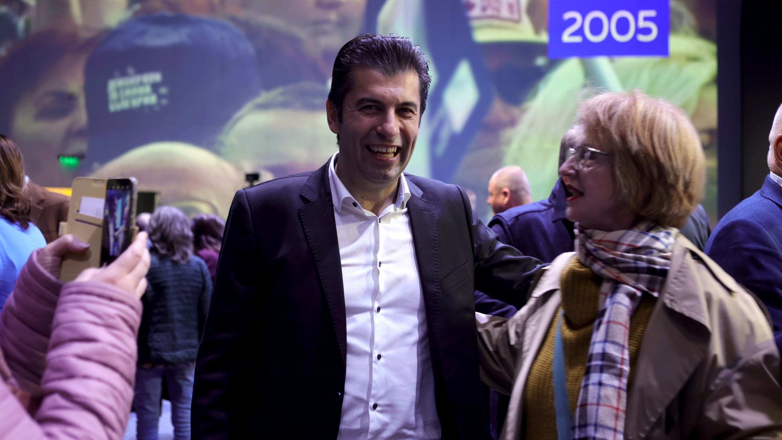 Kiril Petkov, leader of We Continue the Change party, is seen among his supporters Sunday, Oct. 20, 2024, in Sofia, as Bulgarians are called to cast ballots on Sunday in the seventh general elections in just over three years. (AP Photo/Valentina Petrova)