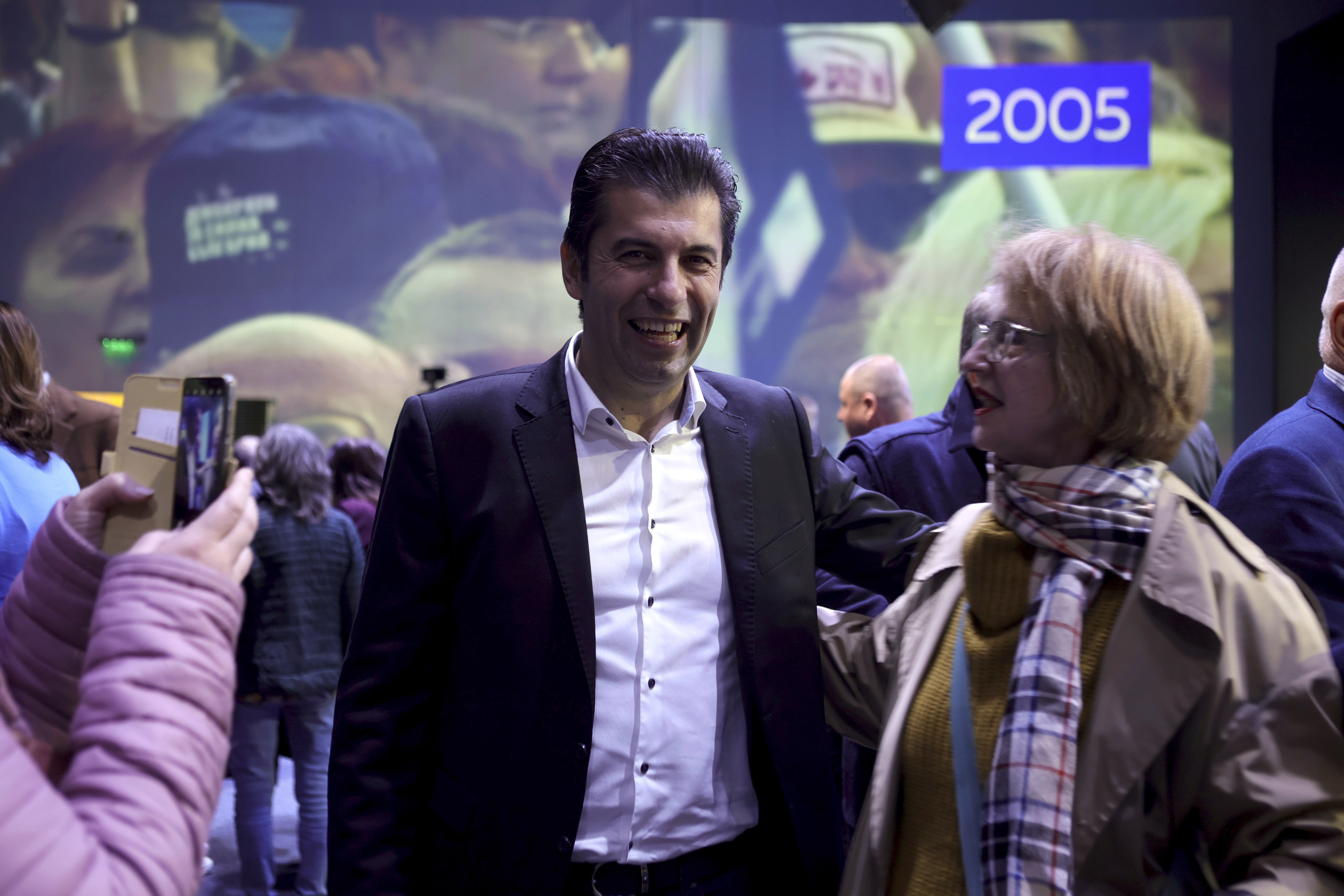 Kiril Petkov, leader of We Continue the Change party, is seen among his supporters Sunday, Oct. 20, 2024, in Sofia, as Bulgarians are called to cast ballots on Sunday in the seventh general elections in just over three years. (AP Photo/Valentina Petrova)