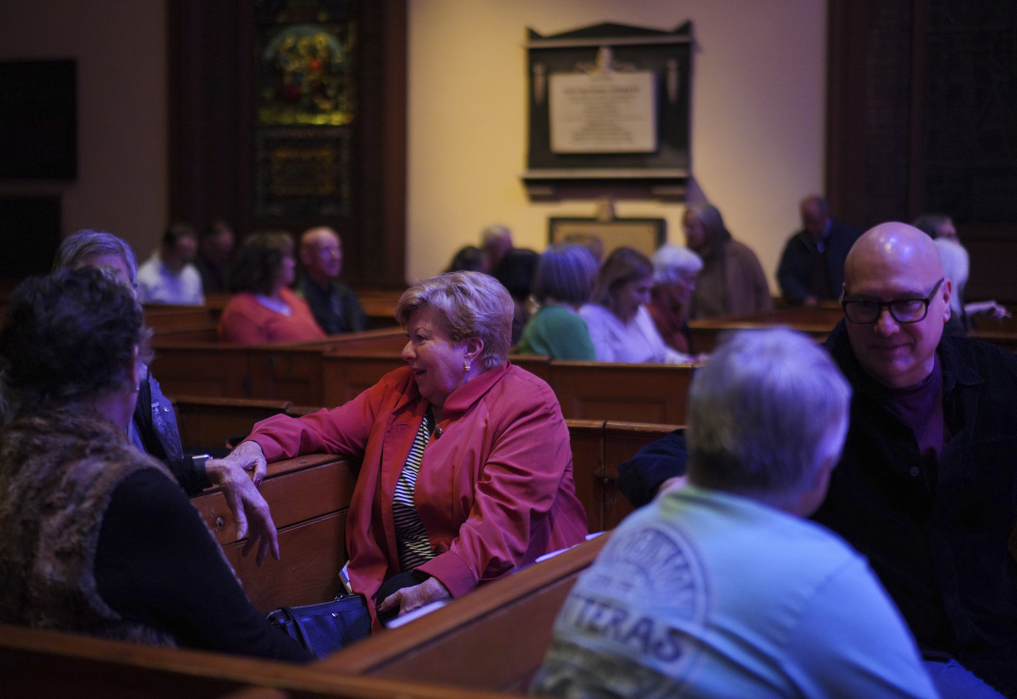 People gather at St. James Episcopal Church in Lancaster, Pa., for a "Contemplative Citizenship" service, on Tuesday, Oct. 15, 2024. (AP Photo/Jessie Wardarski)