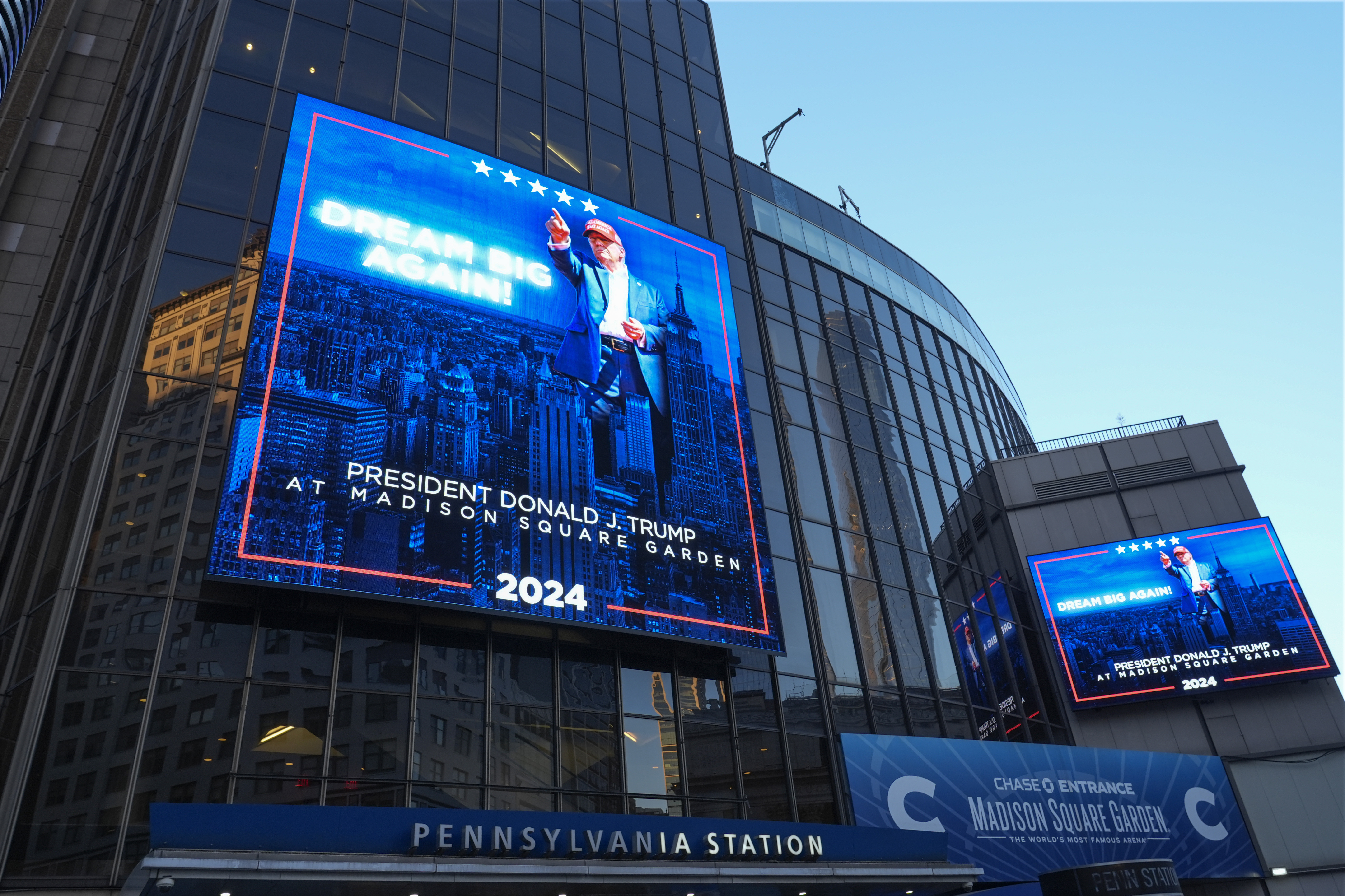 Video boards outside Madison Square Garden display information about the campaign rally for Republican presidential nominee former President Donald Trump Sunday, Oct. 27, 2024, in New York. (AP Photo/Alex Brandon)