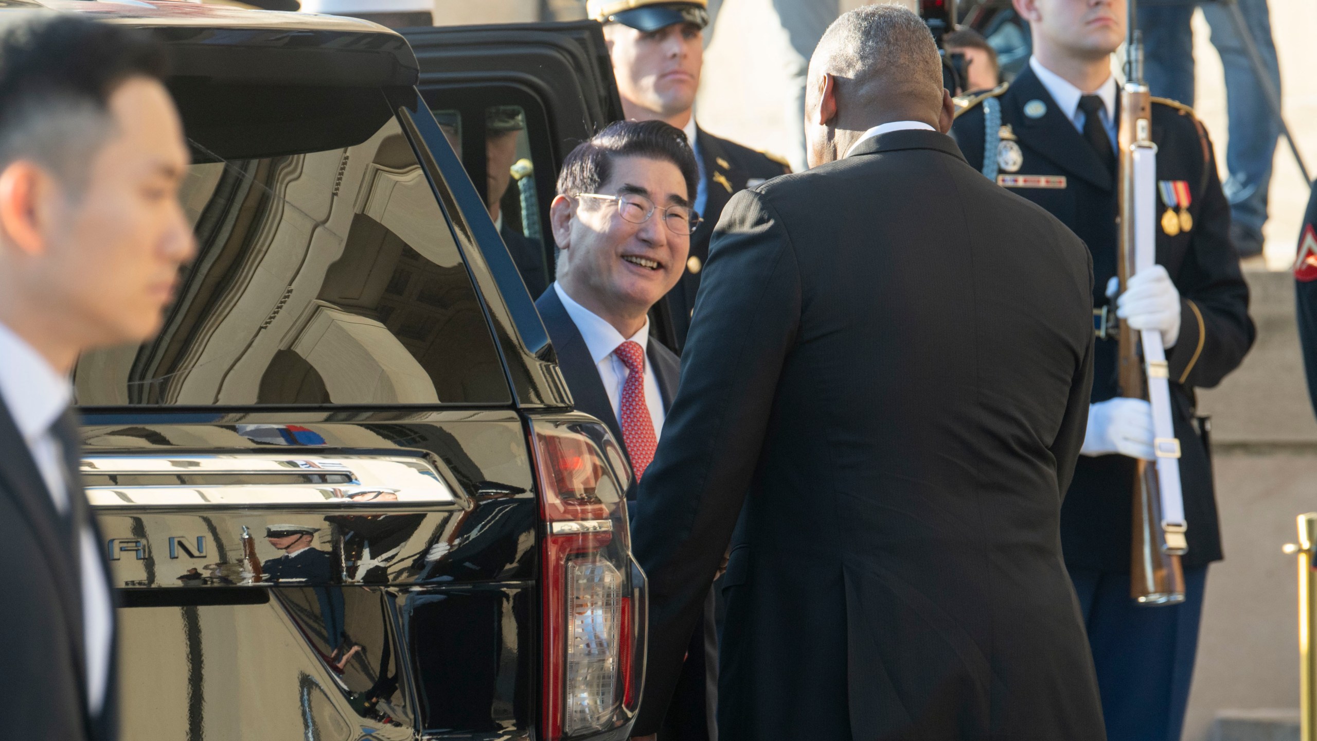 Defense Secretary Lloyd Austin welcomes South Korean Defense Minister Kim Yong Hyun, center, to the Pentagon on Wednesday, Oct. 30, 2024 in Washington. (AP Photo/Kevin Wolf)