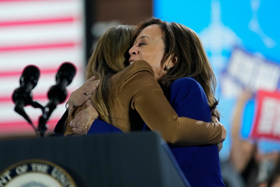 Jennifer Lopez, left, hugs Democratic presidential nominee Vice President Kamala Harris during a campaign rally Thursday, Oct. 31, 2024, in North Las Vegas, Nev. (AP Photo/John Locher)