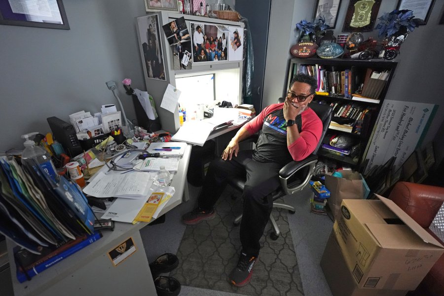 Small business owner Michael Hooks sits in the office of his catering business in Erie, Pa. Friday, Nov. 1, 2024. (AP Photo/Gene J. Puskar)