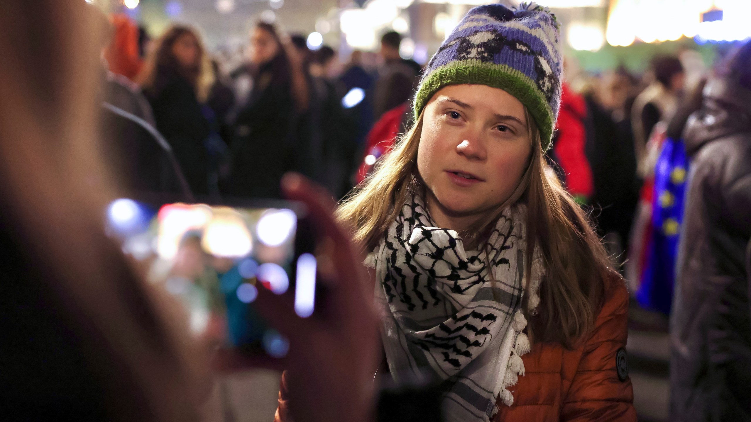 Sweden's climate activist Greta Thunberg takes part in a rally against alleged violations in a recent parliamentary election in Tbilisi, Georgia, on Monday, Nov. 4, 2024. (AP Photo)