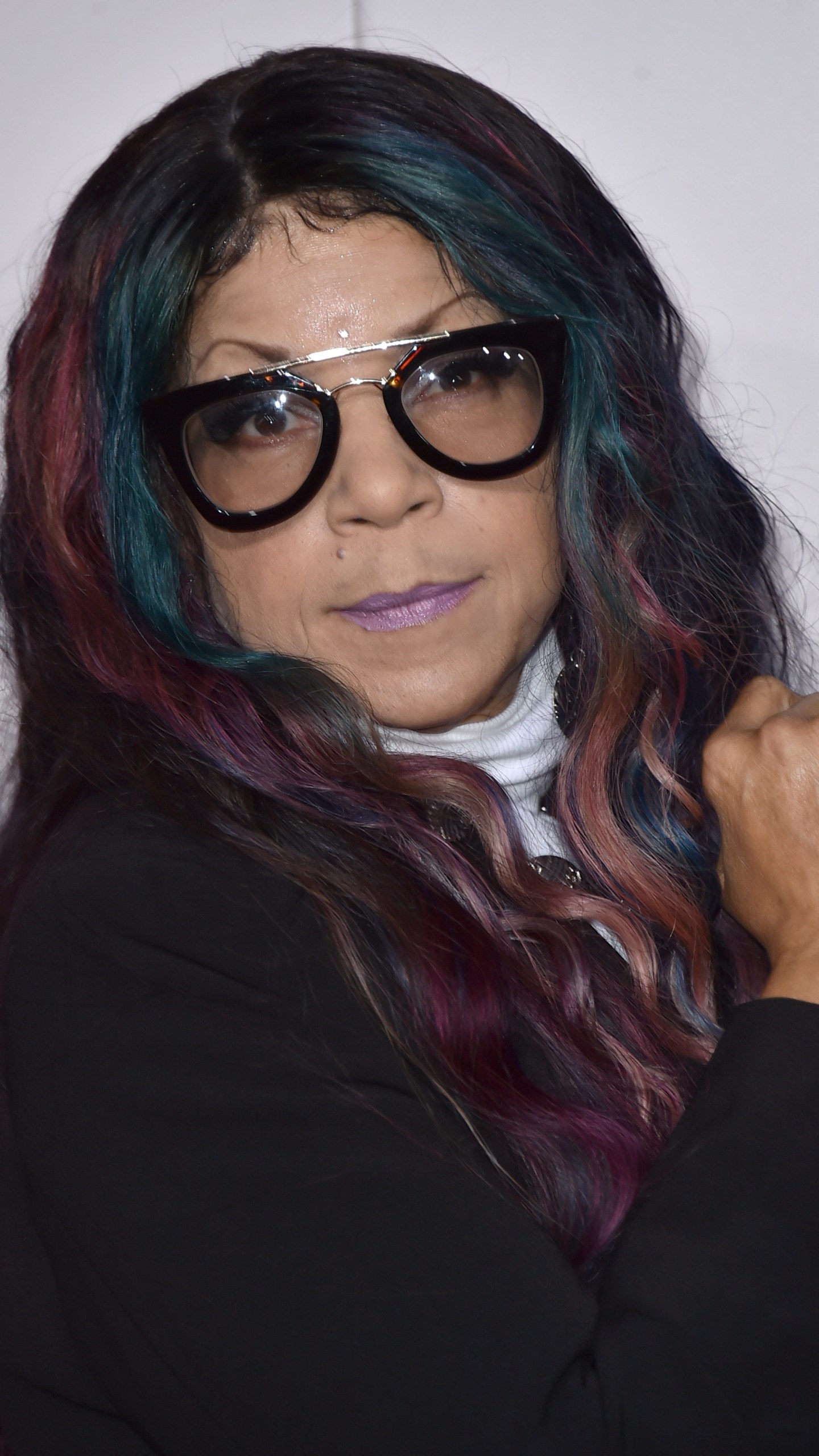 FLE - Tyka Nelson, sister of the late musician Prince, appears at the American Music Awards on Nov. 20, 2016, in Los Angeles. Nelson, Prince’s only full sibling, died Monday. She was 64. Her son President Nelson says she died at a hospital in Robbinsdale, Minnesota. A cause of death was not immediately available. (Photo by Jordan Strauss/Invision/AP, File)