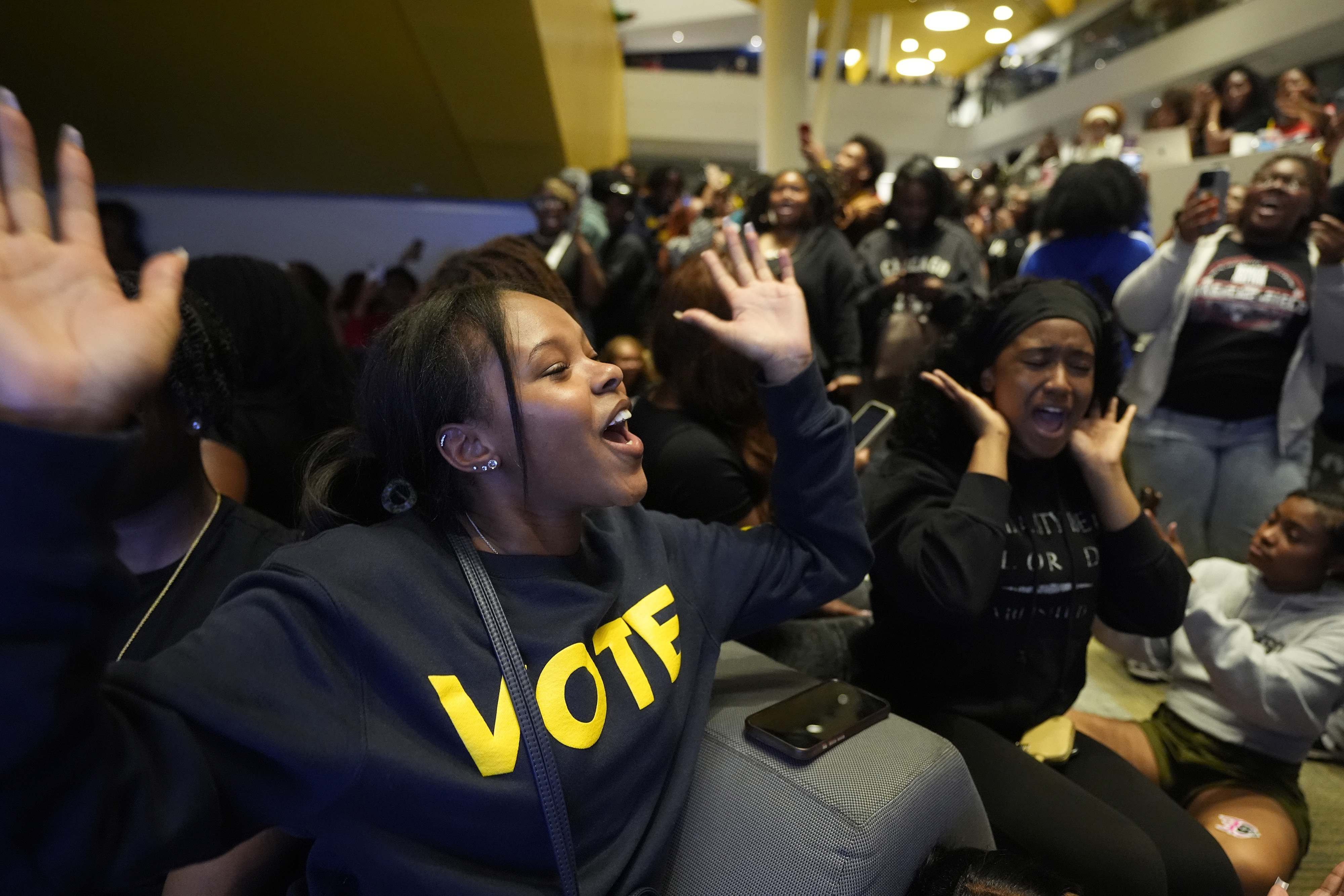 Zion Dawkins, an North Carolina A&T student, gathers with other students for an election night watch party, Tuesday, Nov. 5, 2024, in Greensboro, N.C. (AP Photo/George Walker IV)