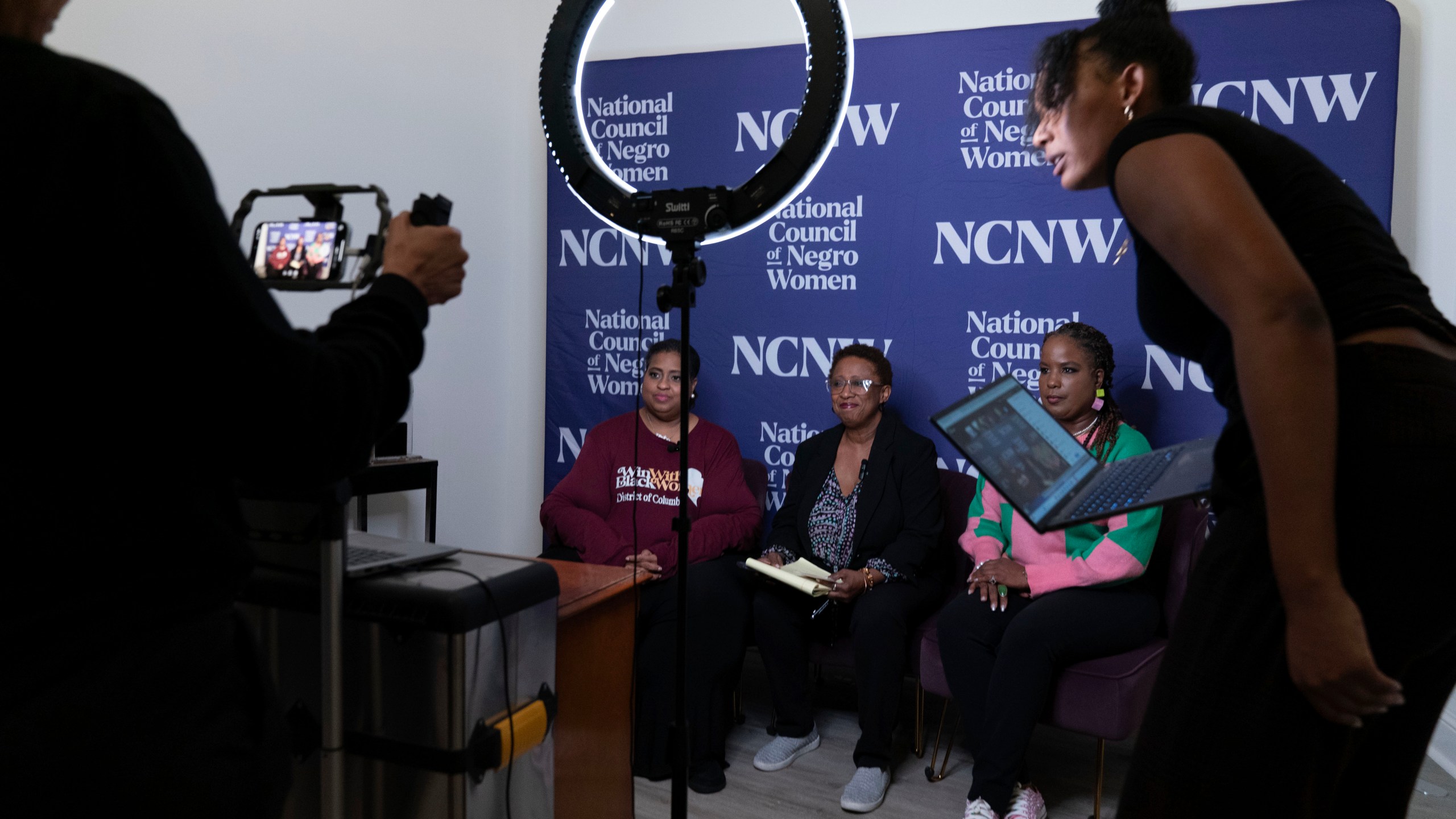 Members of the Black Women's Leadership Collective from left; Holli Holliday, President, Sisters Lead Sisters Vote & lead organizer, Win With Black Women, Portia Reddick White, Vice President Advocacy and Policy, National Council of Negro Women (NCNW) and Roslyn Brock, Chairman Emeritus, NAACP, share election updates and voting information in battleground communities via livestream at the national Council of Negro Women in Washington, Tuesday, Nov. 5, 2024. (AP Photo/Jose Luis Magana)