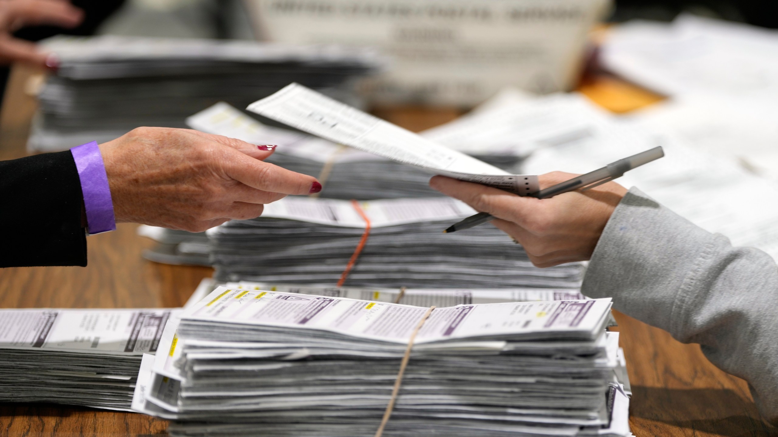 Election workers process ballots for the 2024 General Election, Tuesday, Nov. 5, 2024, in Milwaukee. (AP Photo/Morry Gash)