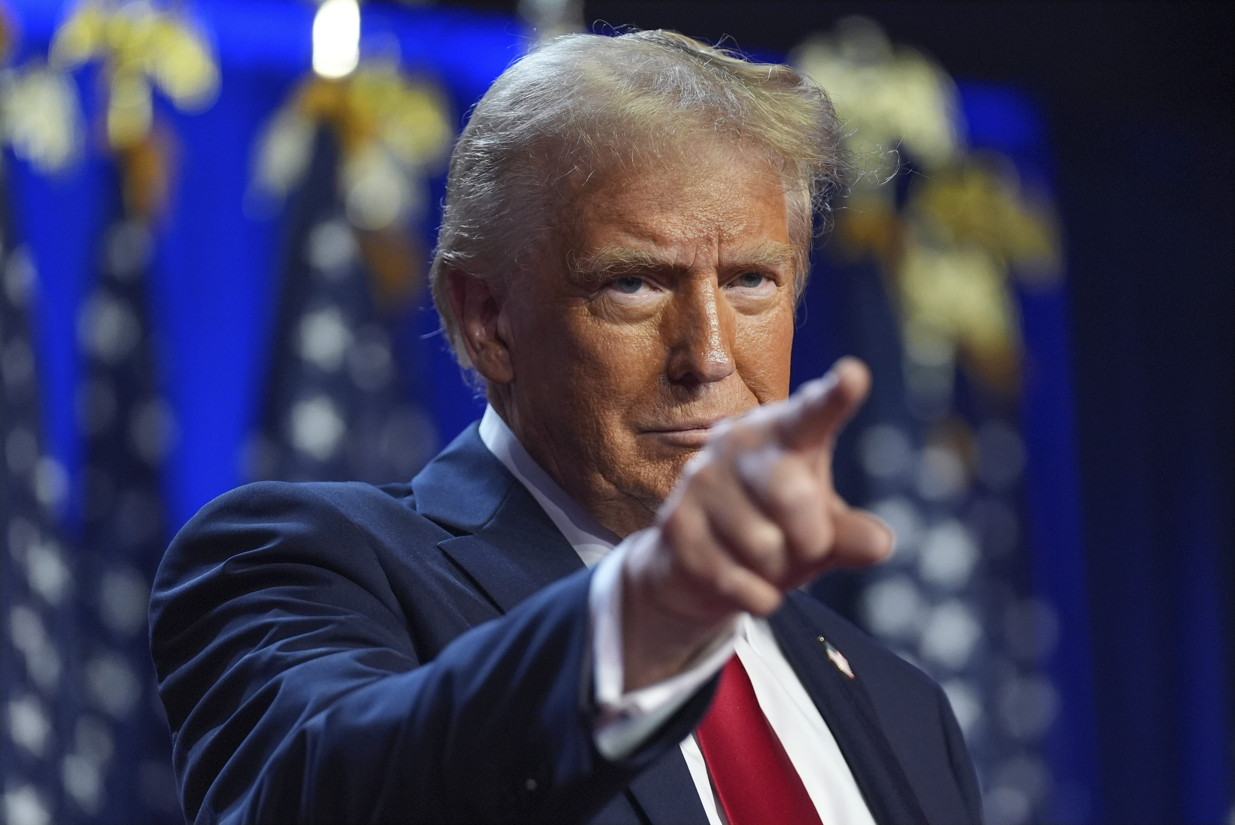 Republican presidential nominee former President Donald Trump arrives at an election night watch party at the Palm Beach Convention Center, Wednesday, Nov. 6, 2024, in West Palm Beach, Fla. (AP Photo/Evan Vucci)