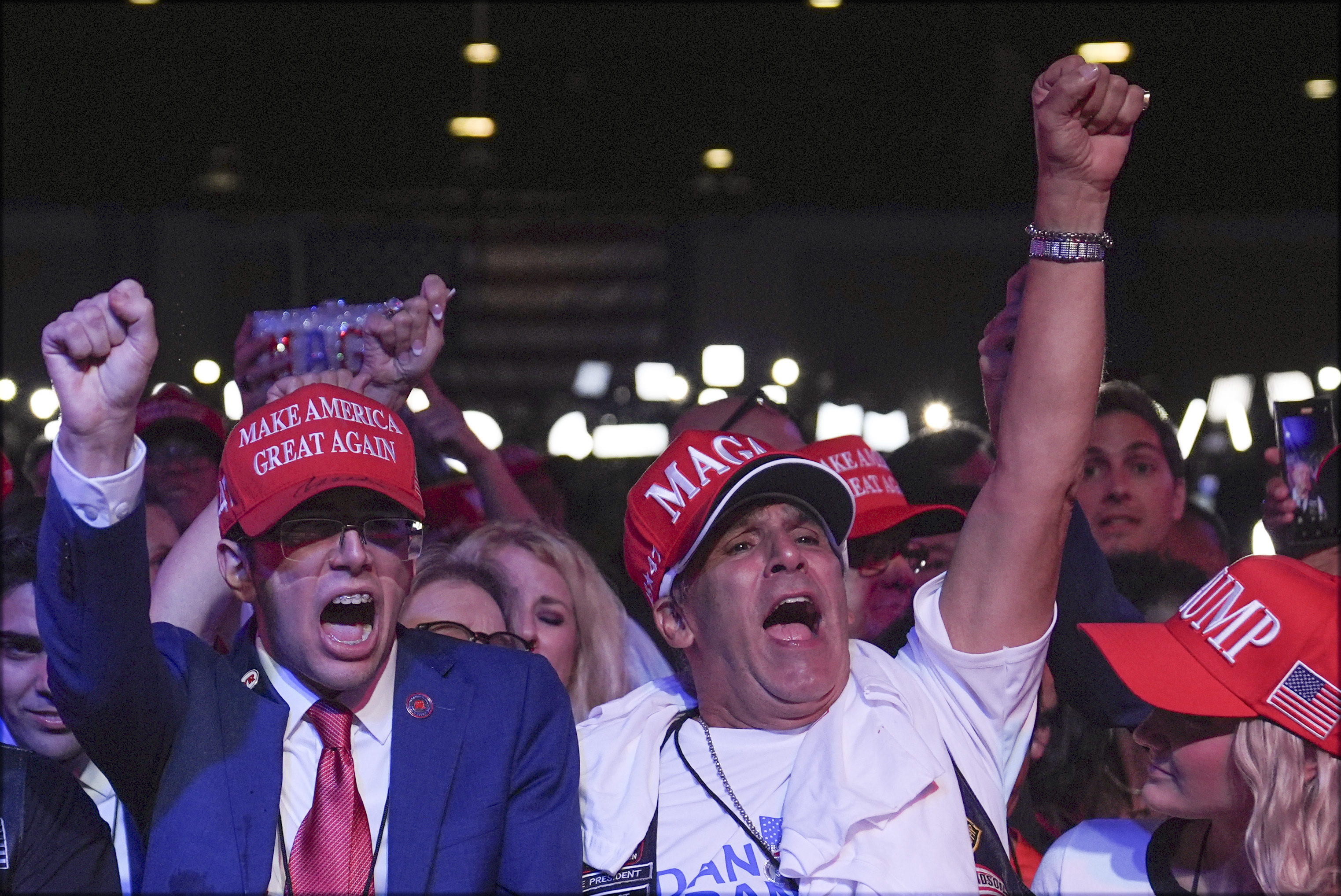 Supporters arrive at an election night watch party for Republican presidential nominee former President Donald Trump Tuesday, Nov. 5, 2024, in West Palm Beach, Fla. (AP Photo/Evan Vucci)