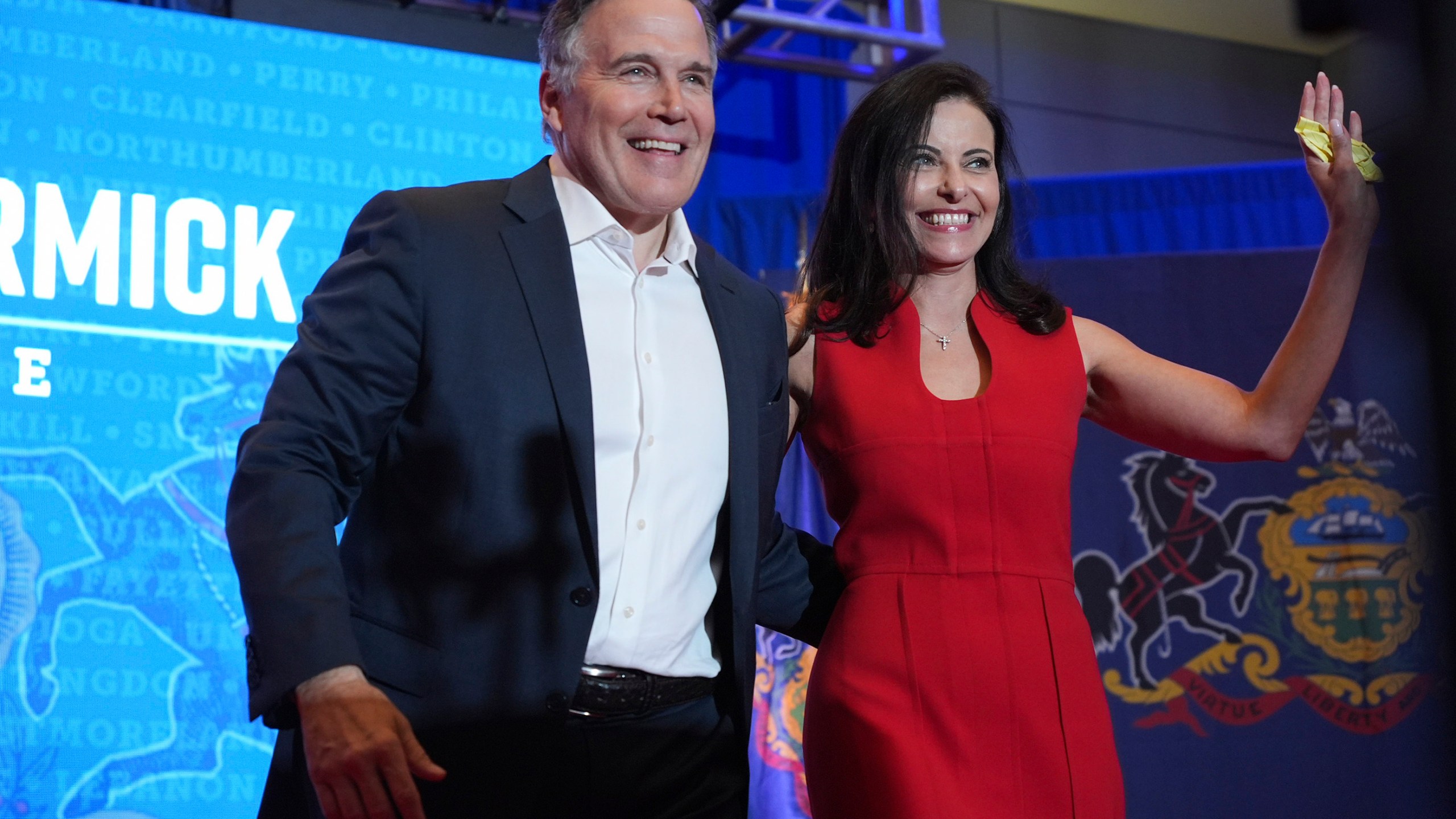 Republican Pennsylvania Senate candidate David McCormick, left, arrives to speak with his wife, Dina Powell, during an election night watch party, Wednesday, Nov. 6, 2024, in Pittsburgh. (AP Photo/Gene J. Puskar)