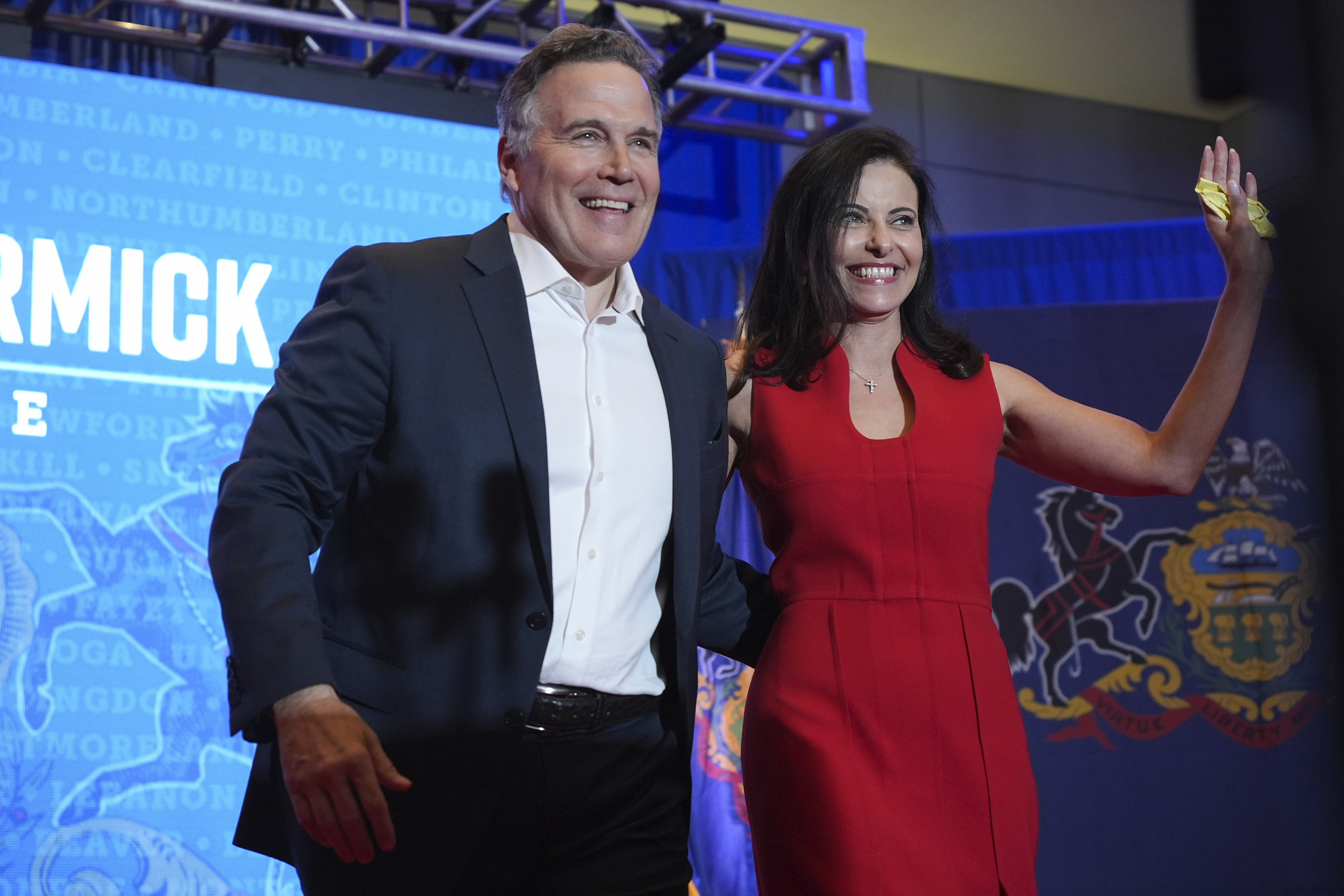 Republican Pennsylvania Senate candidate David McCormick, left, arrives to speak with his wife, Dina Powell, during an election night watch party, Wednesday, Nov. 6, 2024, in Pittsburgh. (AP Photo/Gene J. Puskar)