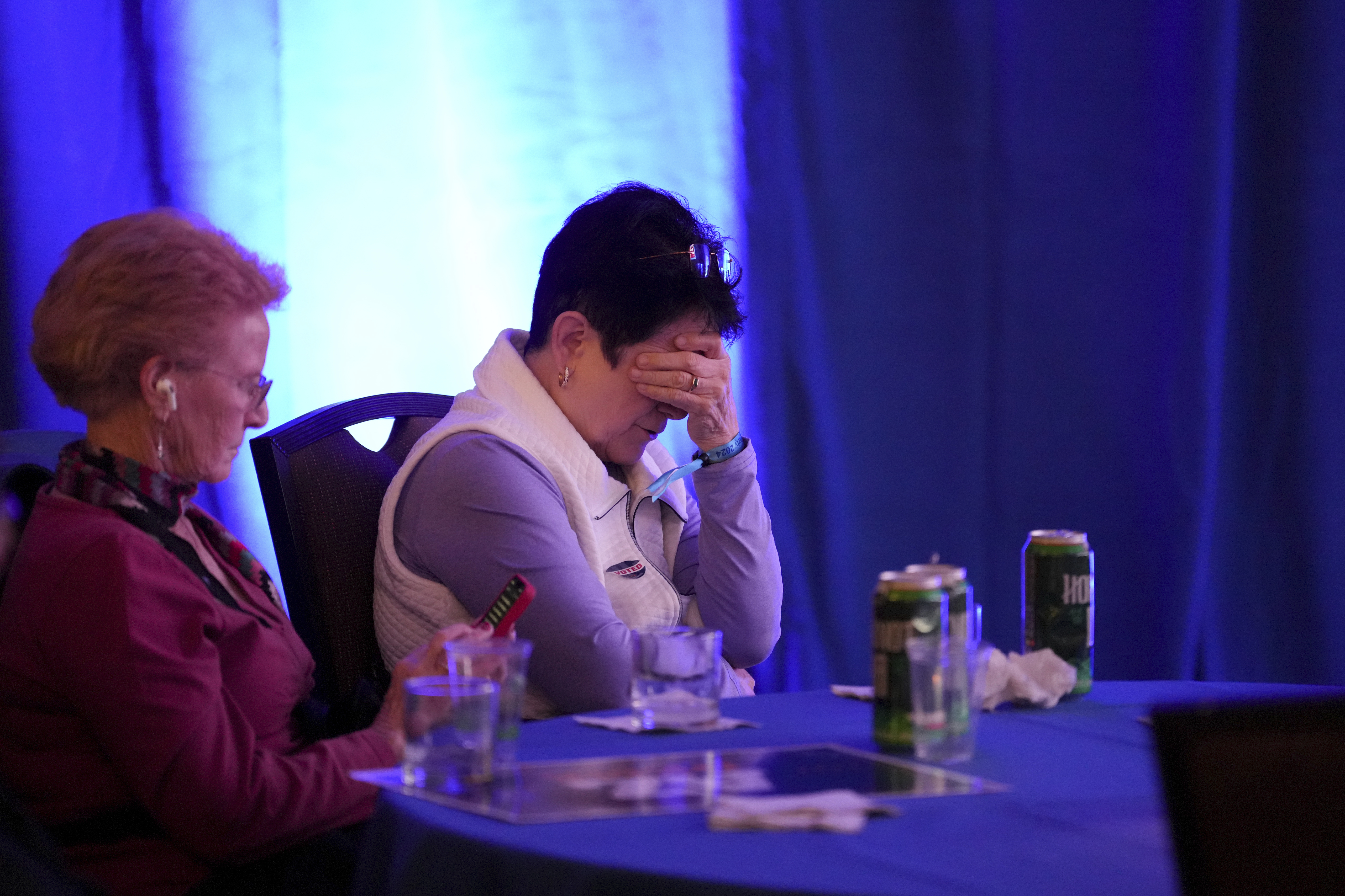 People attend an Arizona Democrats watch party on election night Tuesday, Nov. 5, 2024, in Phoenix. (AP Photo/Ross D. Franklin)