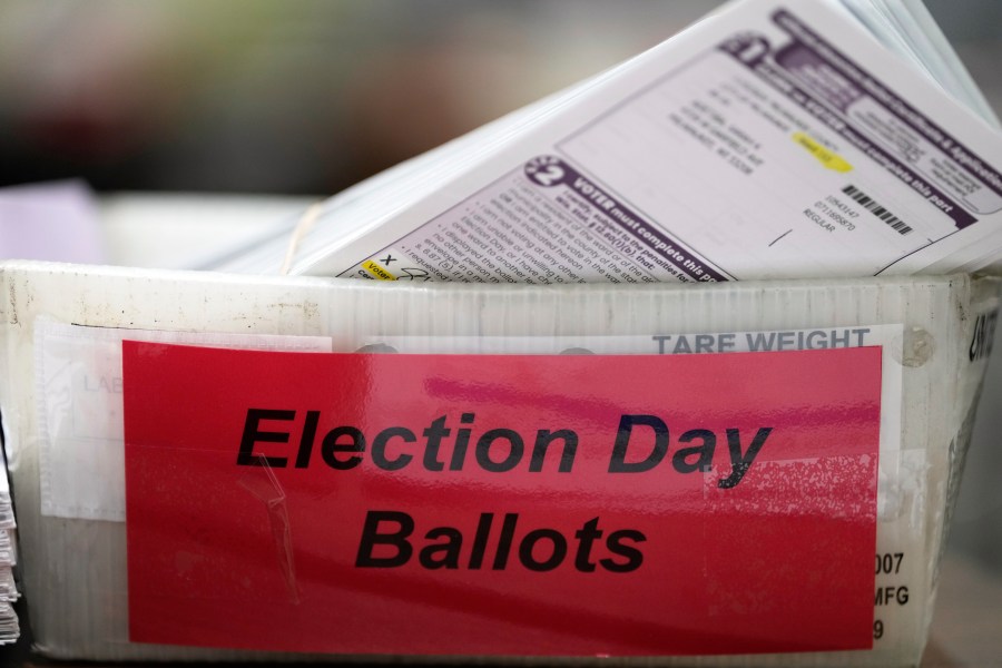 Cast ballots fill a tray, Tuesday, Nov. 5, 2024, in Milwaukee. (AP Photo/Morry Gash)