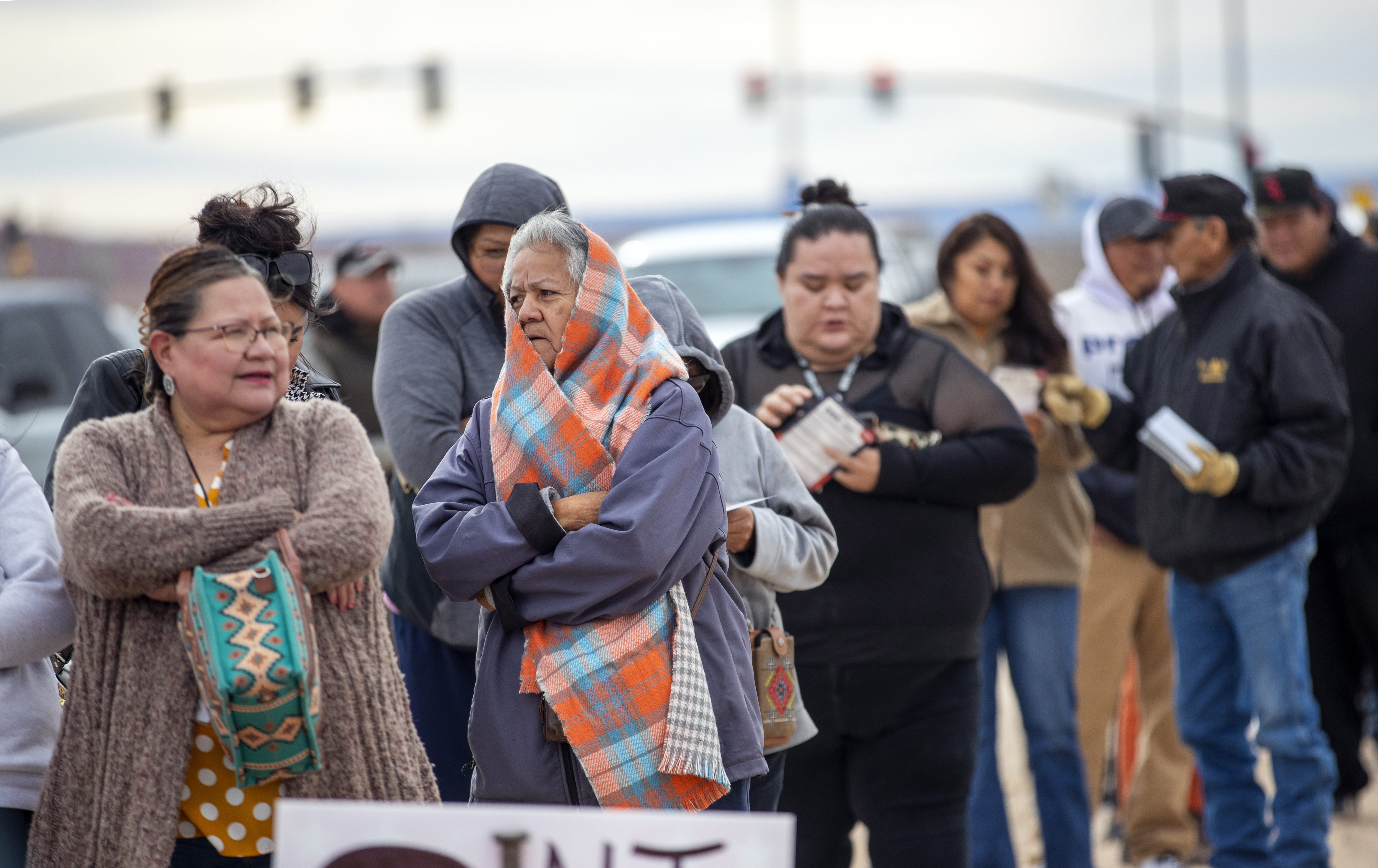 Voters wait in line to cast their ballots outside a polling station on the Navajo Nation in Chinle, Ariz., on Election Day, Tuesday, Nov. 5, 2024. (AP Photo/Andres Leighton)