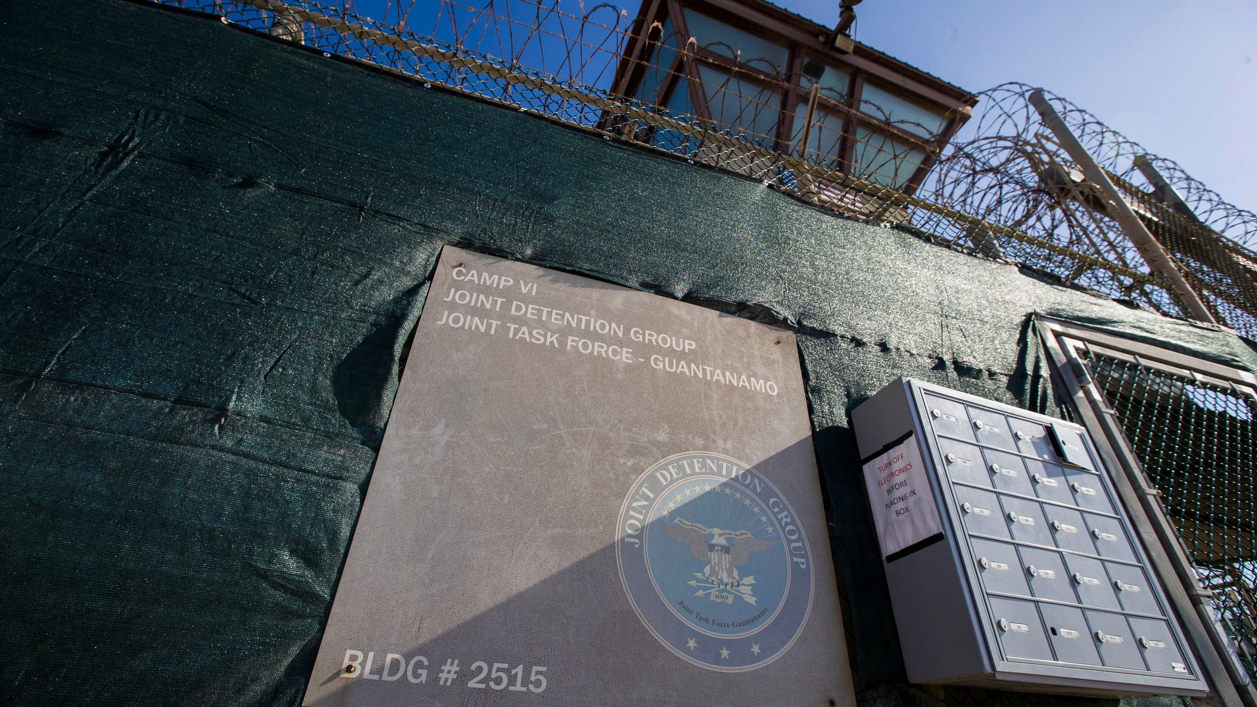 FILE - In this photo reviewed by U.S. military officials, the control tower of Camp VI detention facility is seen on April 17, 2019, in Guantanamo Bay Naval Base, Cuba. (AP Photo/Alex Brandon, File)