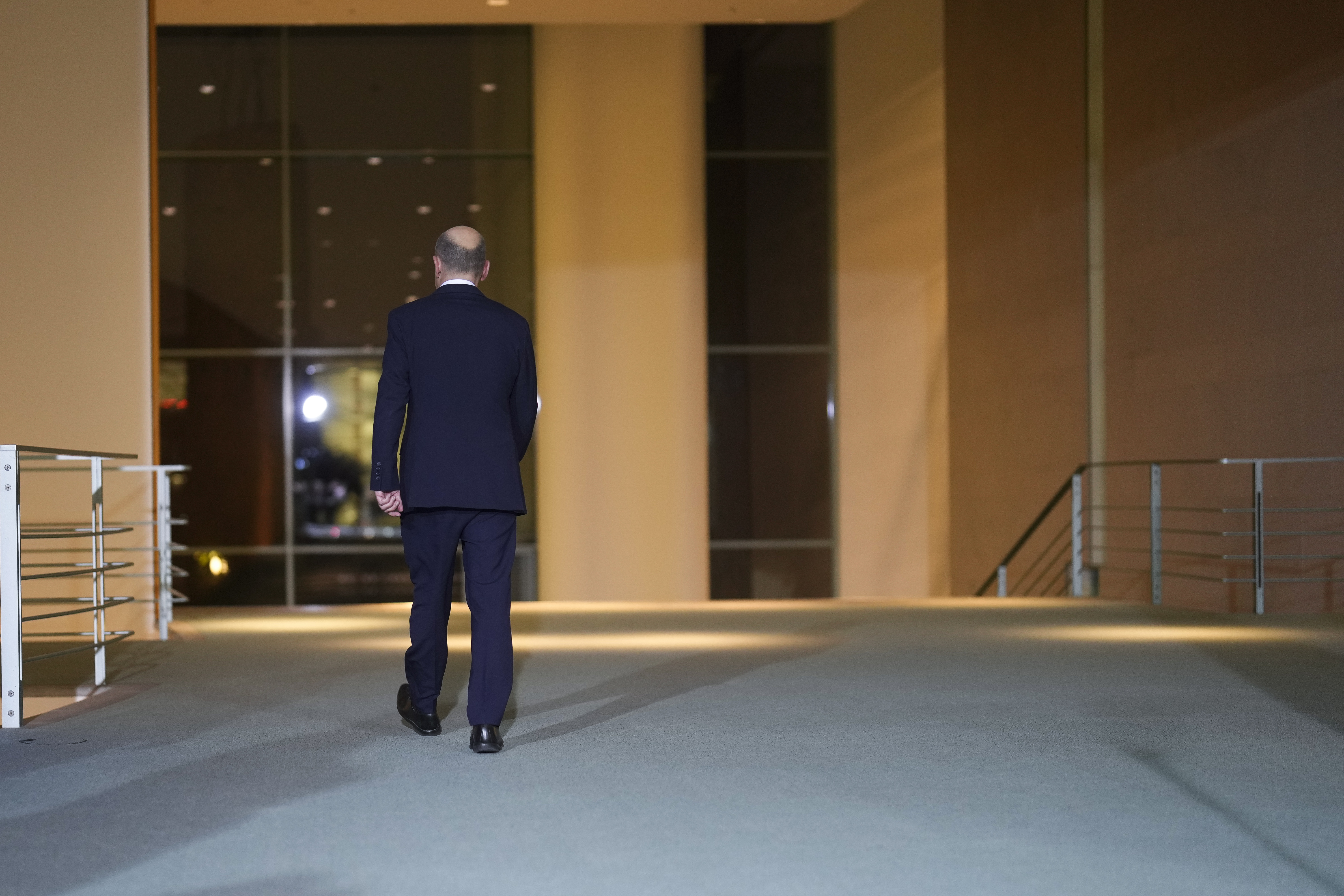 German Chancellor Olaf Scholz leaves after making a statement after a meeting with government leaders in Berlin, Germany, Wednesday, Nov. 6, 2024. (AP Photo/Markus Schreiber)