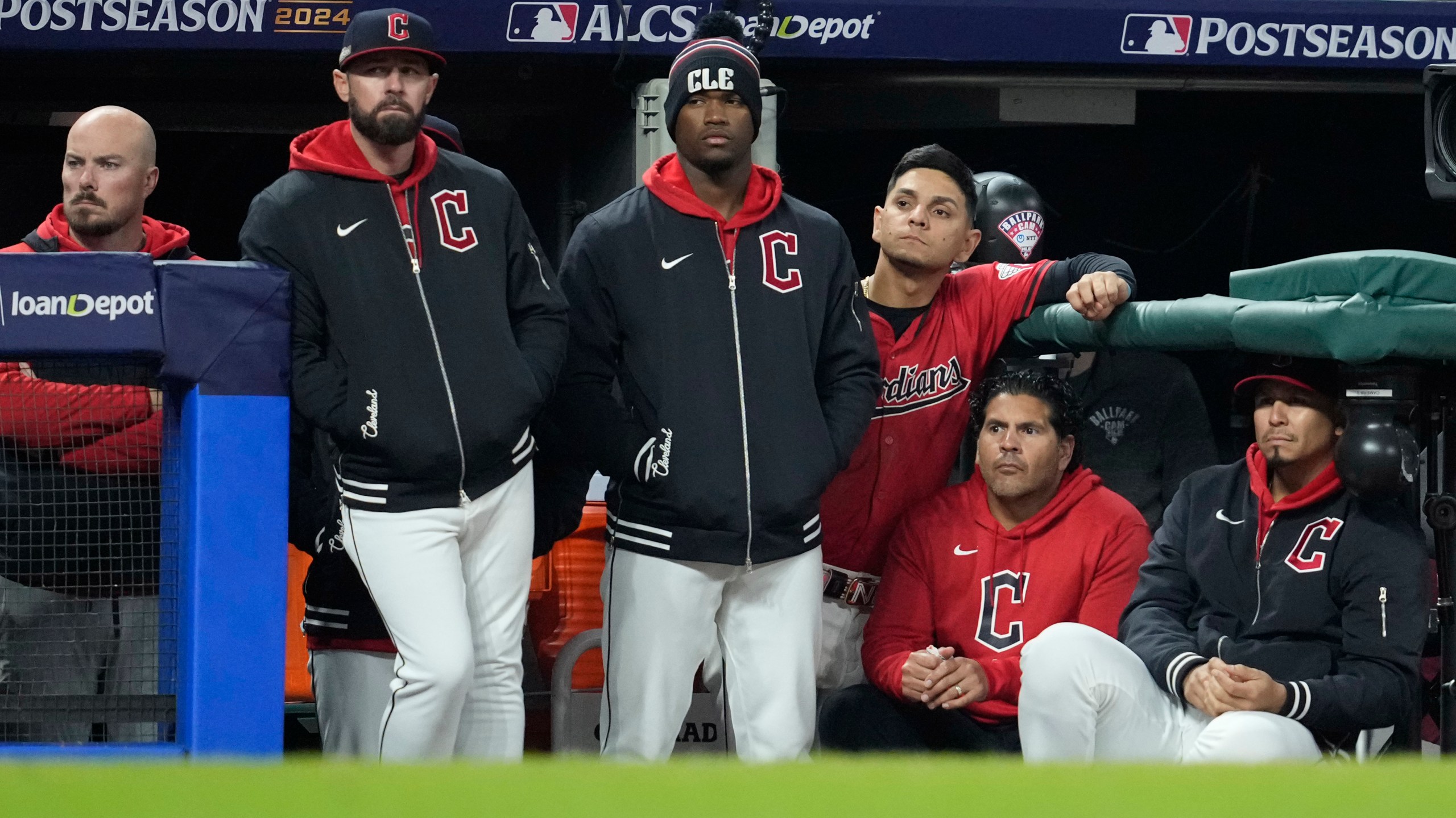 Cleveland Guardians players watch from the dugout during the 10th inning against the New York Yankees in Game 5 of the baseball AL Championship Series Saturday, Oct. 19, 2024, in Cleveland. The Yankees won 5-2. (AP Photo/Godofredo A. Vásquez)