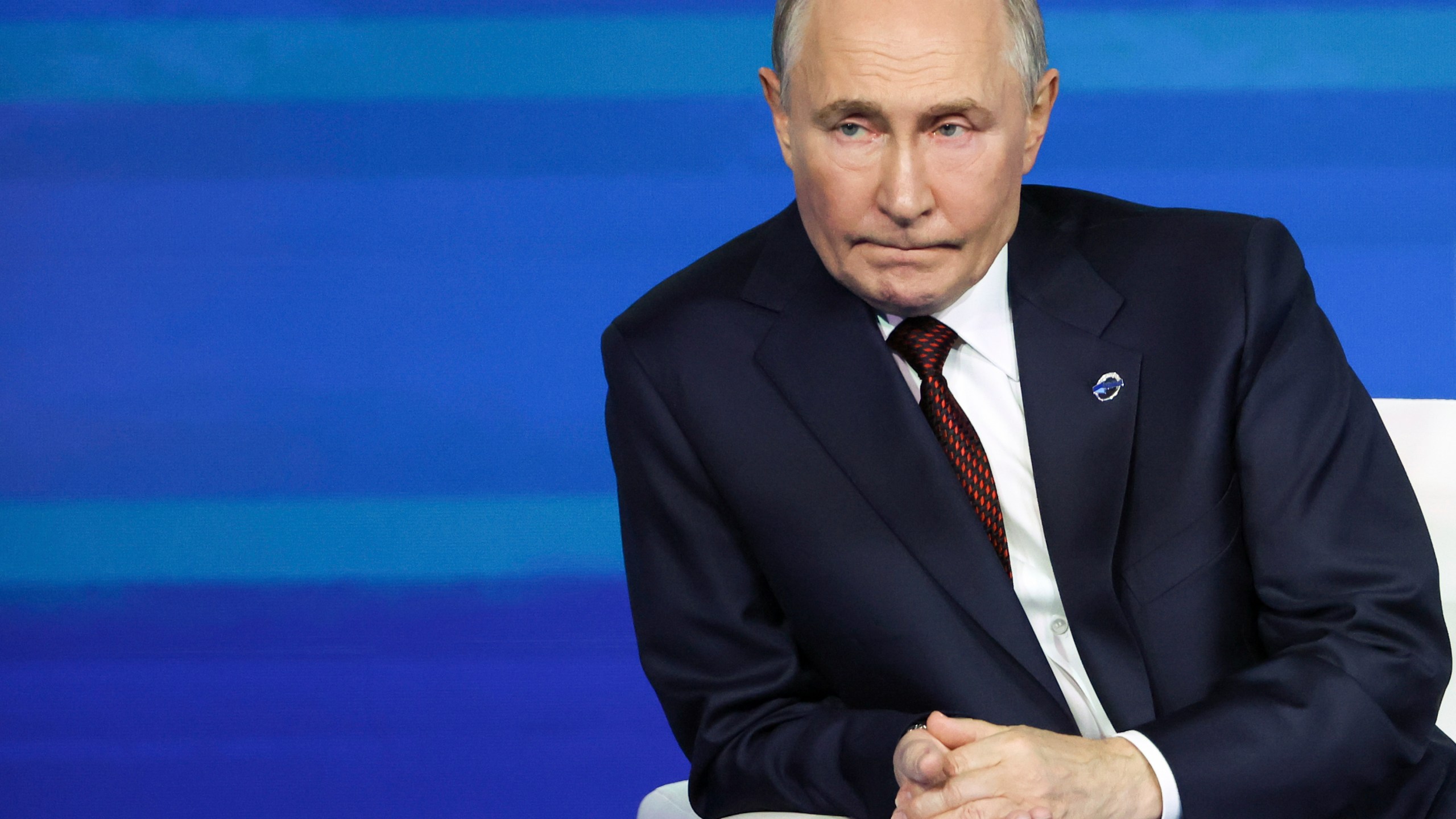 Russian President Vladimir Putin listens to a question during a meeting with foreign policy experts at the Valdai Discussion Club in the Black Sea resort of Sochi, Russia, Thursday, Nov. 7, 2024. (Maxim Shipenkov/Pool Photo via AP)