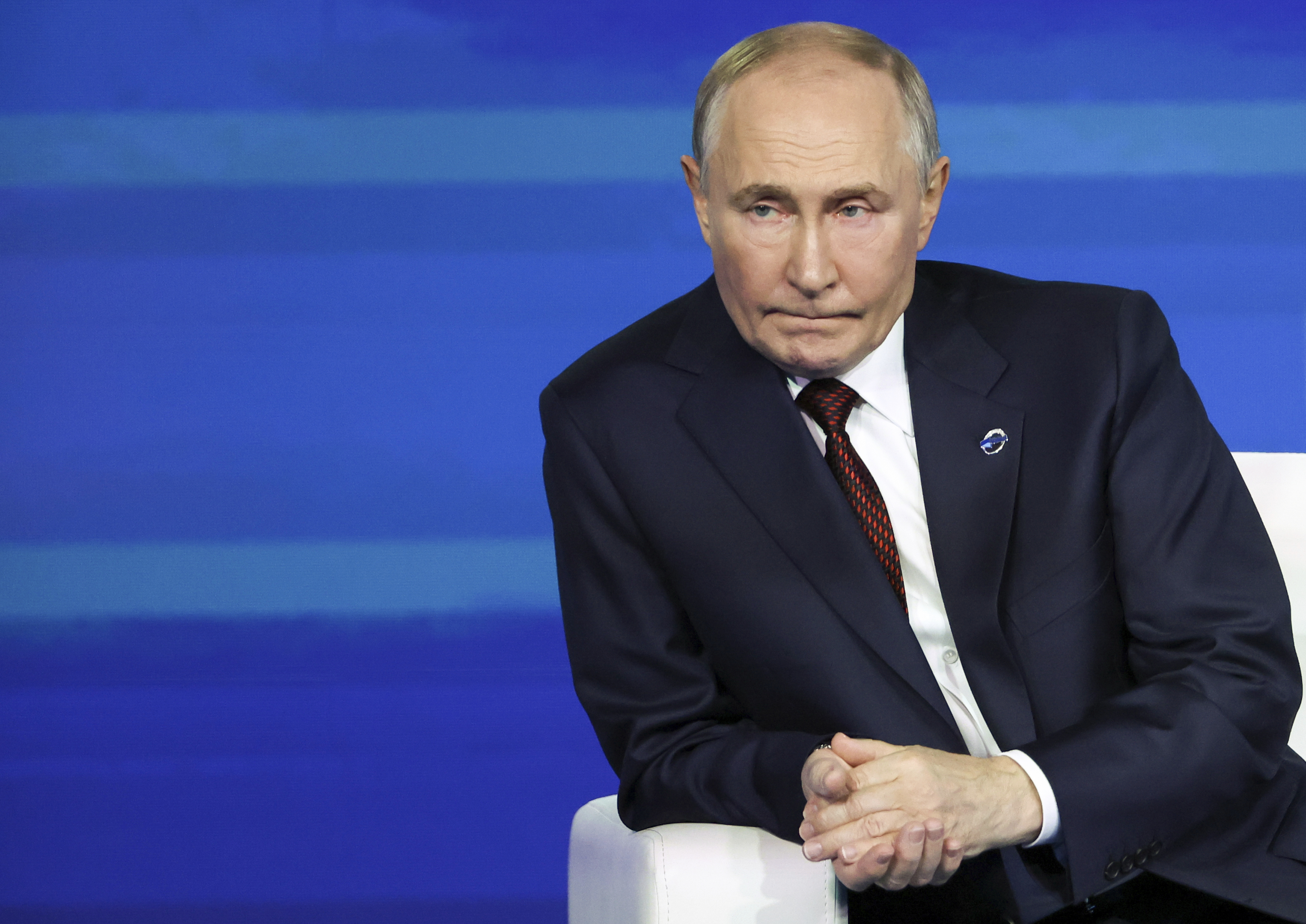 Russian President Vladimir Putin listens to a question during a meeting with foreign policy experts at the Valdai Discussion Club in the Black Sea resort of Sochi, Russia, Thursday, Nov. 7, 2024. (Maxim Shipenkov/Pool Photo via AP)