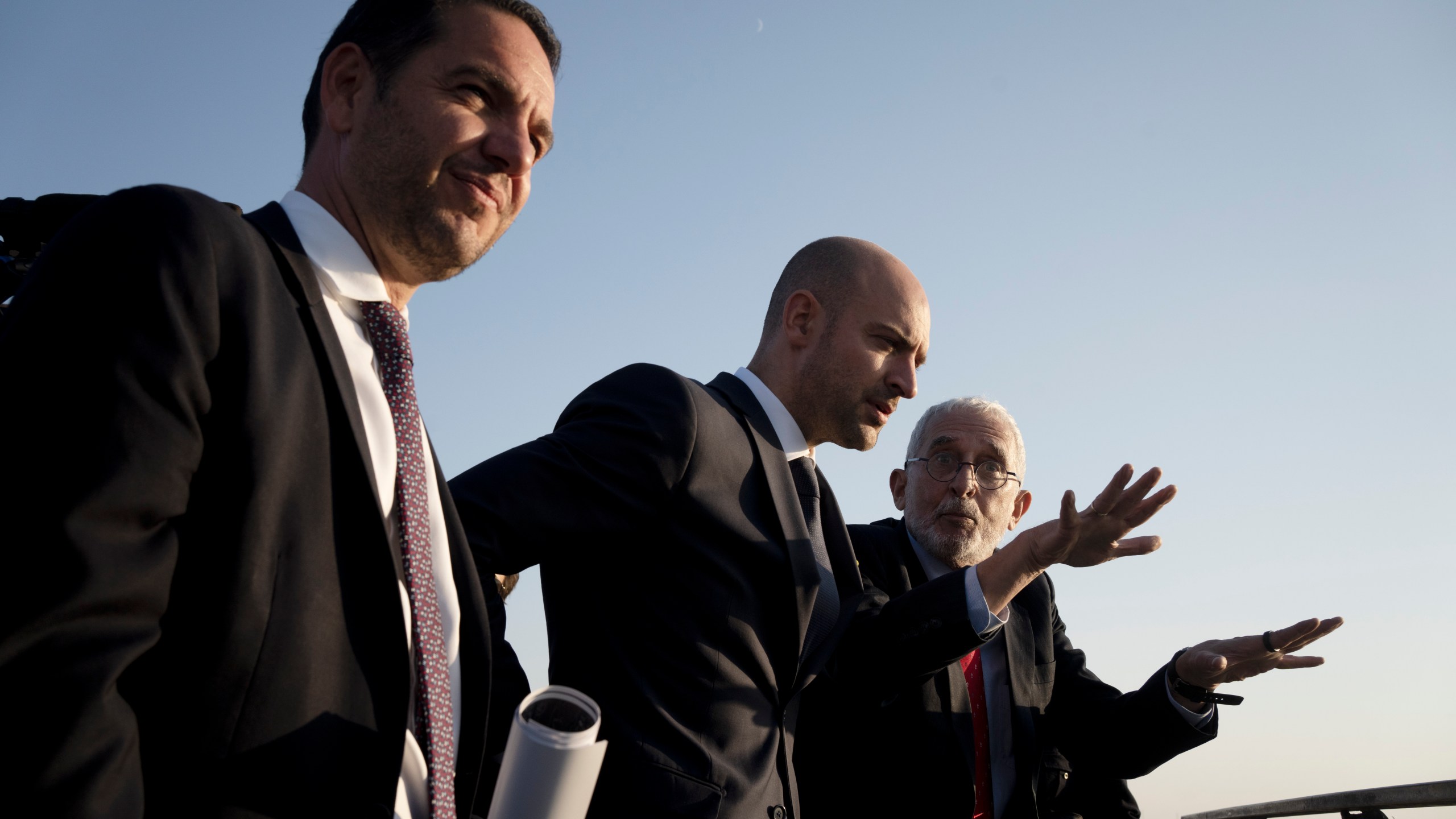 French Foreign Minister Jean-Noël Barrot, center, is briefed by Daniel Seidemann, right, overlooking the Old City of Jerusalem from the Mount of Olives during his visit to Jerusalem, Thursday, Nov. 7, 2024. (AP Photo/Maya Alleruzzo)