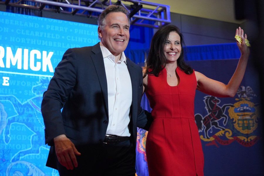 Republican Pennsylvania Senate candidate David McCormick, left, arrives to speak with his wife, Dina Powell, during an election night watch party, Wednesday, Nov. 6, 2024, in Pittsburgh. (AP Photo/Gene J. Puskar)