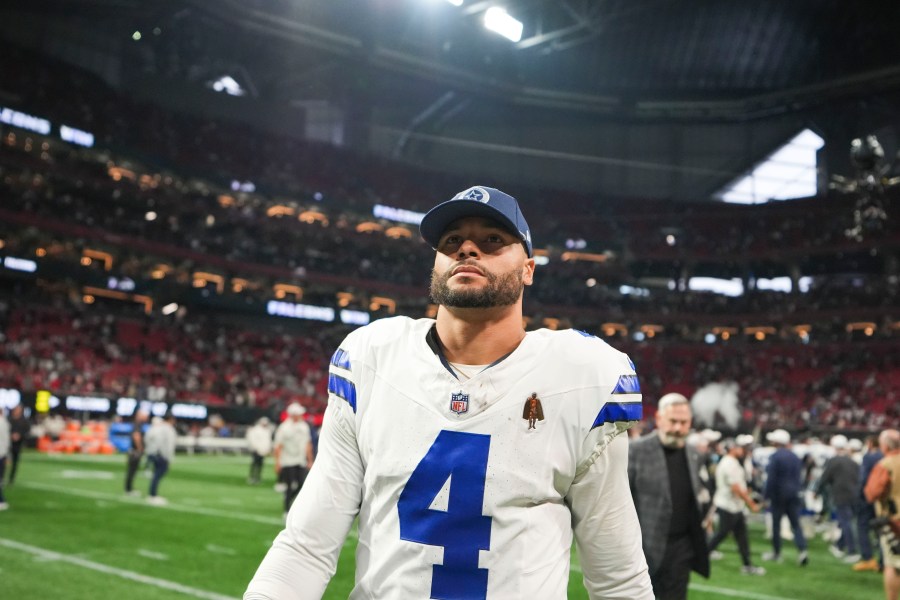 Dallas Cowboys quarterback Dak Prescott (4) walks off the field after an NFL football game against the Atlanta Falcons, Sunday, Nov. 3, 2024, in Atlanta. The Falcons won 27-21. (AP Photo/ Brynn Anderson)