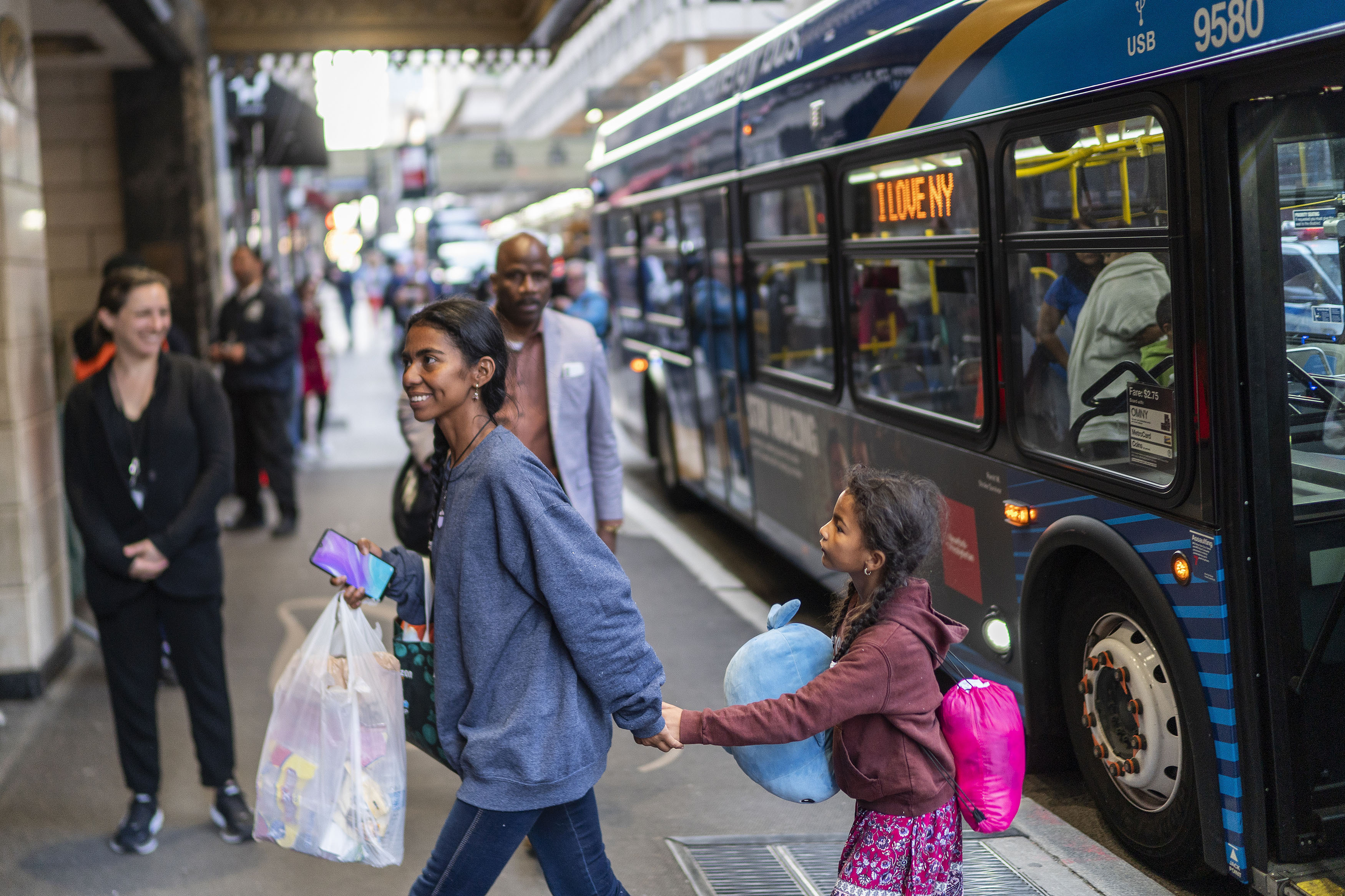 FILE - Asylum seekers arrive at the Roosevelt Hotel on Friday, May 19, 2023, in New York. (AP Photo/Eduardo Munoz Alvarez, File)