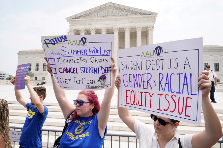 FILE - People demonstrate outside the Supreme Court, June 30, 2023, in Washington. (AP Photo/Jacquelyn Martin, File)