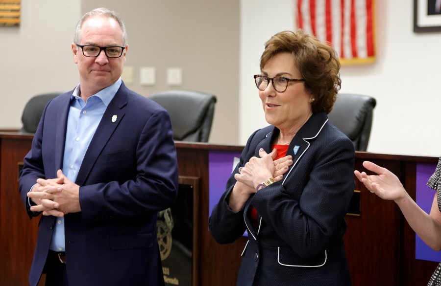 Sen. Jacky Rosen, right, D-Nev., arrives to give a victory speech at the Teamsters Local 631 meeting hall Saturday, Nov. 9, 2024, in Las Vegas. Tommy Blitsch, Secretary-Treasurer of the Teamsters Local 631, stands at left. (Steve Marcus/Las Vegas Sun via AP)