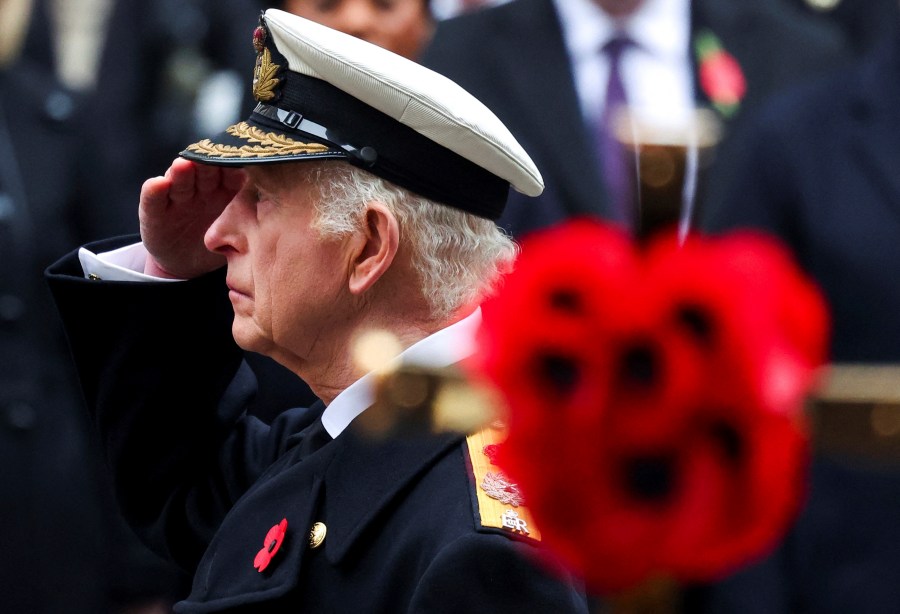 Britain's King Charles attends the Remembrance Sunday ceremony at The Cenotaph in London, England, Sunday, Nov. 10, 2024. (Toby Melville/Pool Photo via AP)