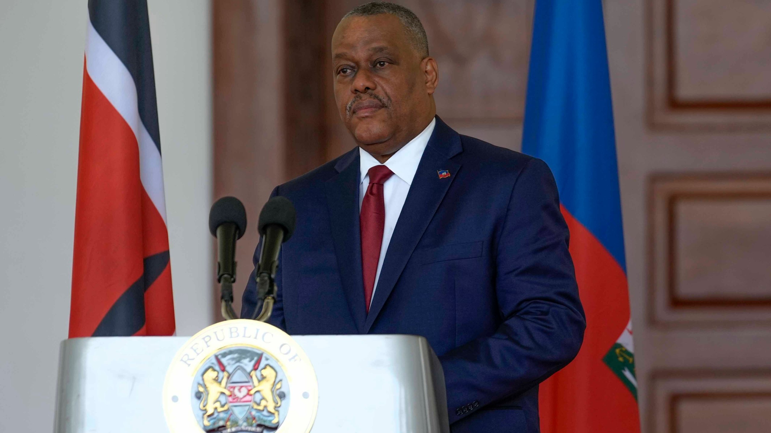 FILE - Haiti Prime Minister Garry Conille speaks during a joint press conference with Kenya's President William Ruto at the State House in Nairobi, Kenya, Oct. 11, 2024. (AP Photo/Brian Inganga, File)