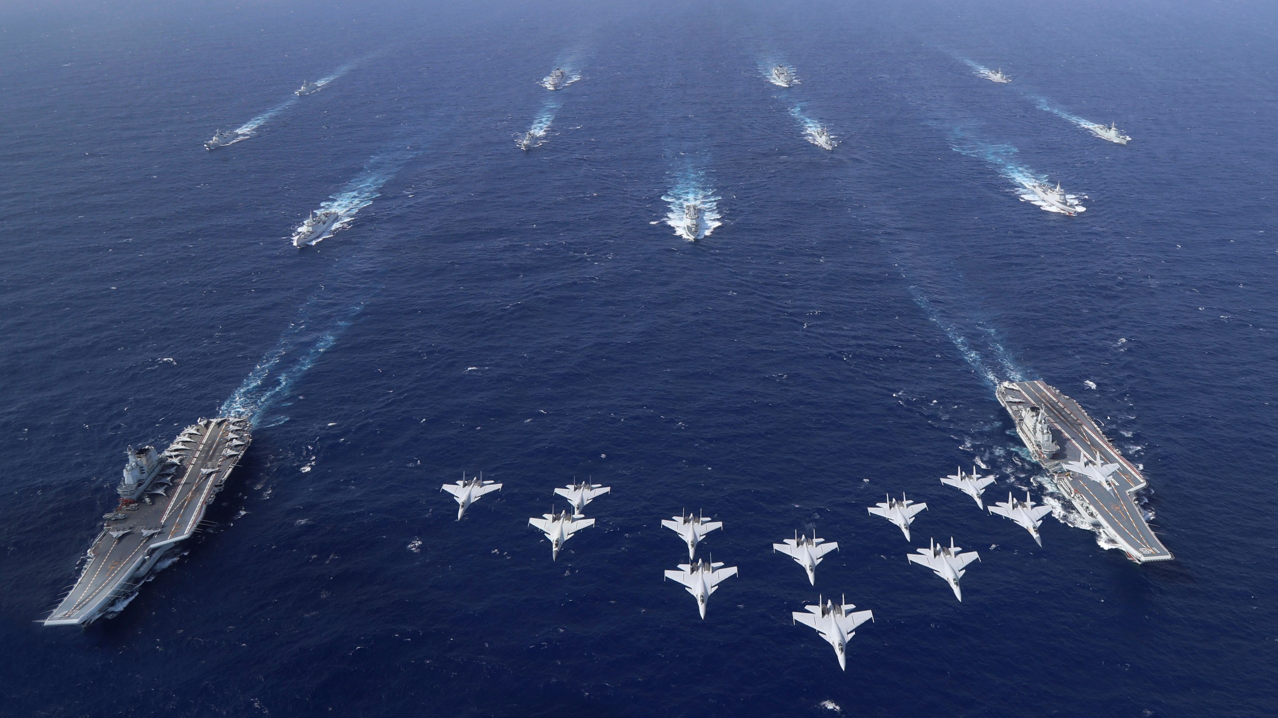 In this photo released by Xinhua News Agency, conventionally powered Chinese aircraft carriers Liaoning and Shandong carry out a dual aircraft carrier formation exercise for the first time in the South China Sea in late October 2024. (Chen Mengxi/Xinhua via AP)