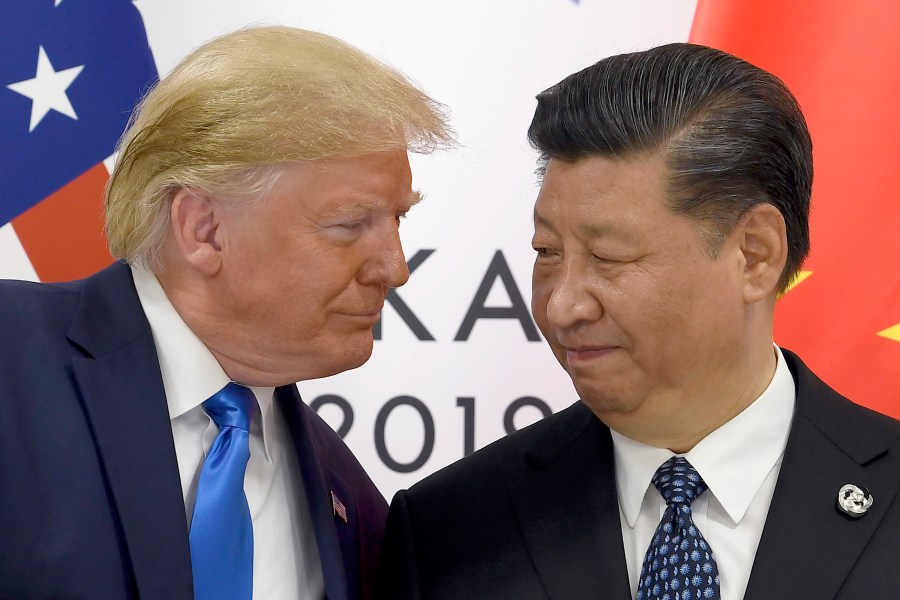 FILE - In this Saturday, June 29, 2019, file photo, U.S. President Donald Trump, left, meets with Chinese President Xi Jinping during a meeting on the sidelines of the G-20 summit in Osaka, Japan.(AP Photo/Susan Walsh, File)