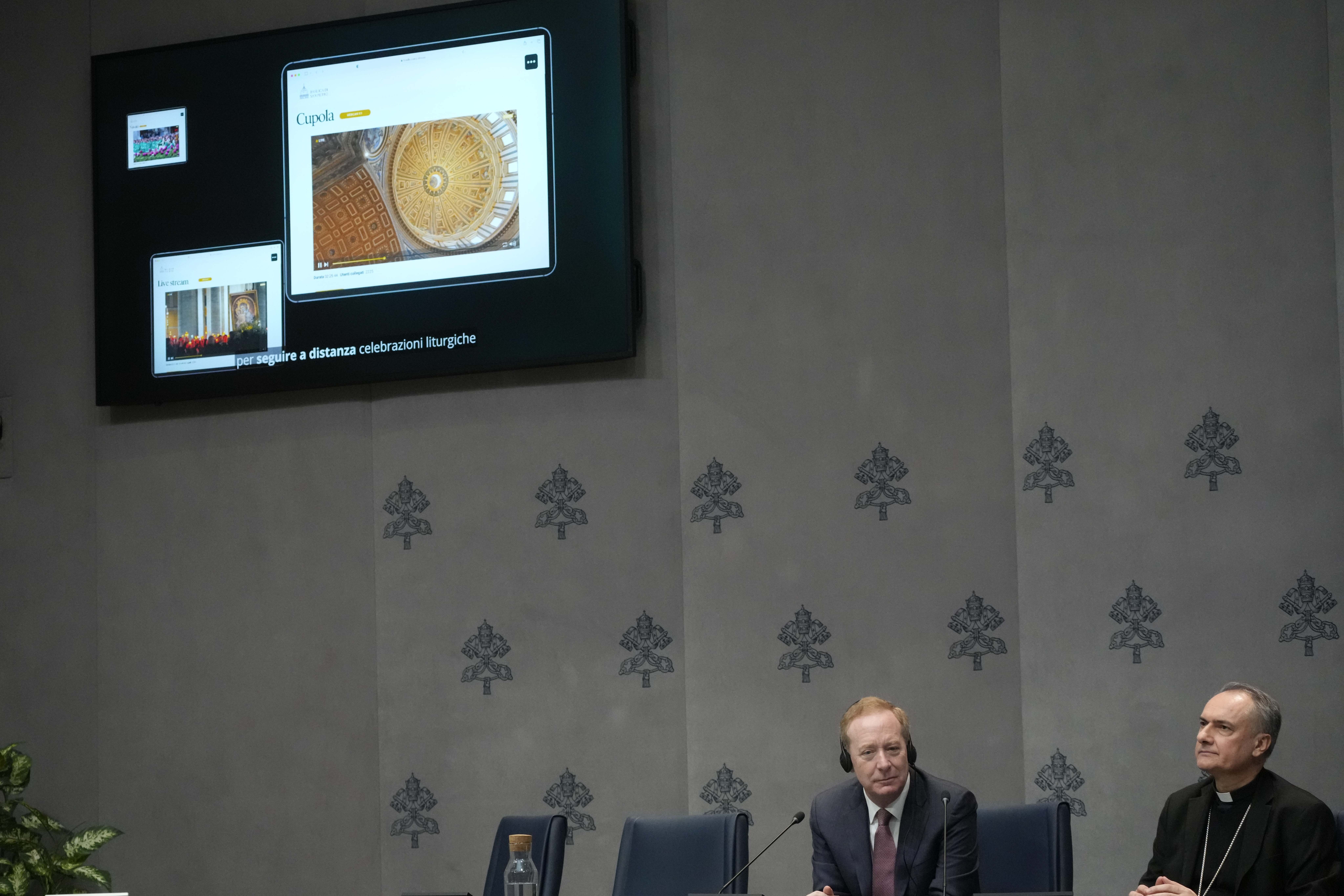 Cardinal Mauro Gambetti, right, and Microsoft's vice-Chairman and President Brad Smith unveil the project "St. Peter's Basilica: AI-Enhanced Experience" during a press conference. at the Vatican, Monday, Nov. 11, 2024. (AP Photo/Gregorio Borgia)