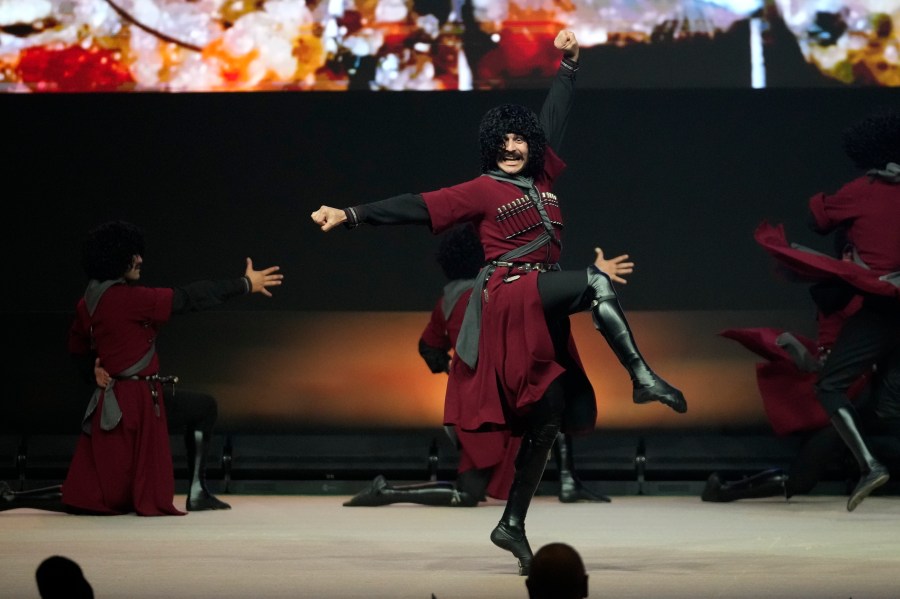 Dancers perform at the COP29 U.N. Climate Summit, Tuesday, Nov. 12, 2024, in Baku, Azerbaijan. (AP Photo/Rafiq Maqbool)