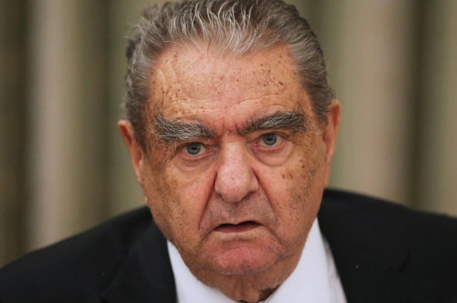 FILE - Vardis J. Vardinoyannis attends a ceremony at the Presidential Palace in Athens, Greece, Tuesday, Sept. 7, 2017. Vardinoyannis a powerful and pivotal figure in Greek shipping and energy who survived a terrorist attack and cultivated close ties with the Kennedy family has died in Athens at age 90. (Greg Chrisohoidis/InTime News via AP, File)