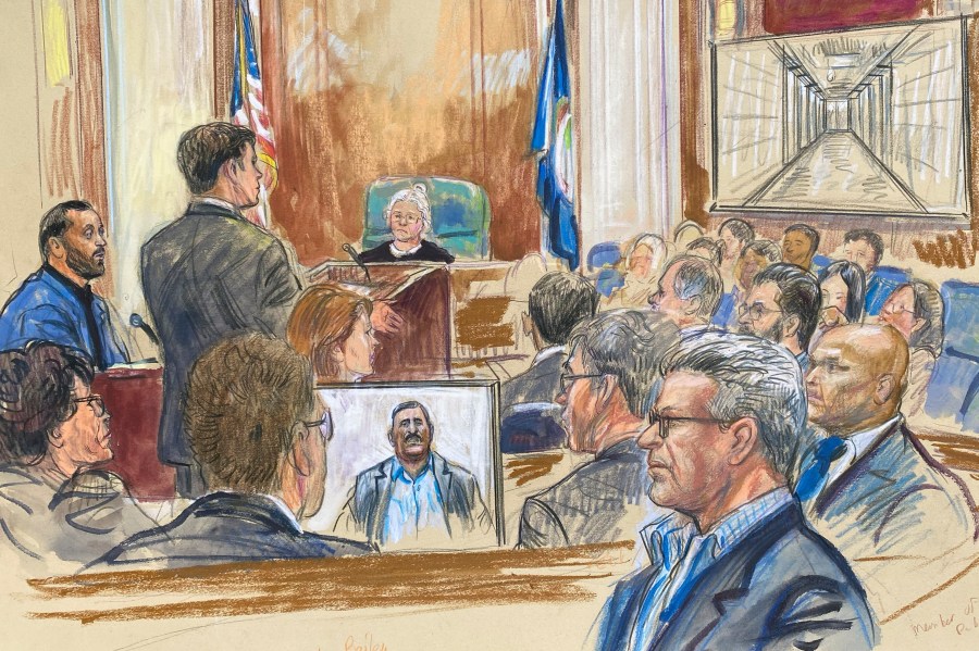 FILE - This courtroom sketch depicts a former detainee at Abu Ghraib prison, Salah Al-Ejaili, foreground with glasses, at the trial of CACI, a Virginia-based military contractor who is accused of contributing to the abuse and torture of detainees at Abu Ghraib, in U.S. District Court in Alexandria, Va., April 16, 2024. (Dana Verkouteren via AP, File)