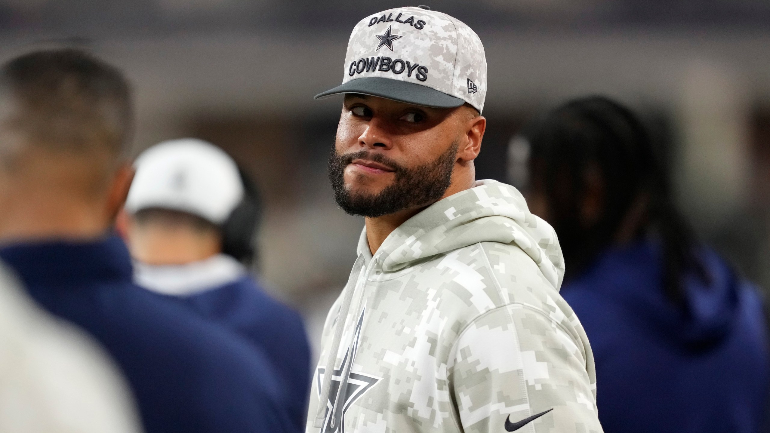 Dallas Cowboys quarterback Dak Prescott watches play against the Philadelphia Eagles in the second half of an NFL football game in Arlington, Texas, Sunday, Nov. 10, 2024. (AP Photo/Jeffrey McWhorter)