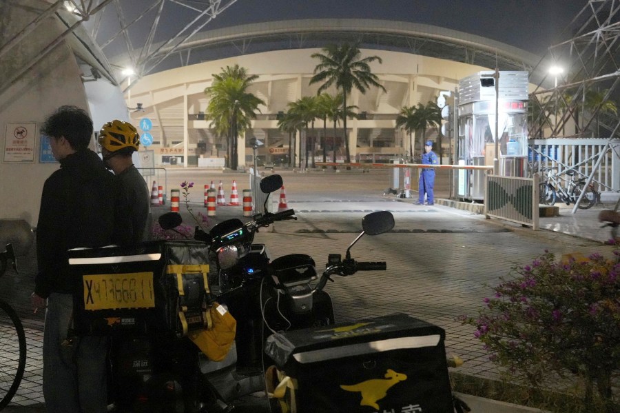 This photo shows a sports center where a man rammed a car into people exercising in Zhuhai, China Monday, Nov. 11, 2024. (Kyodo News via AP)